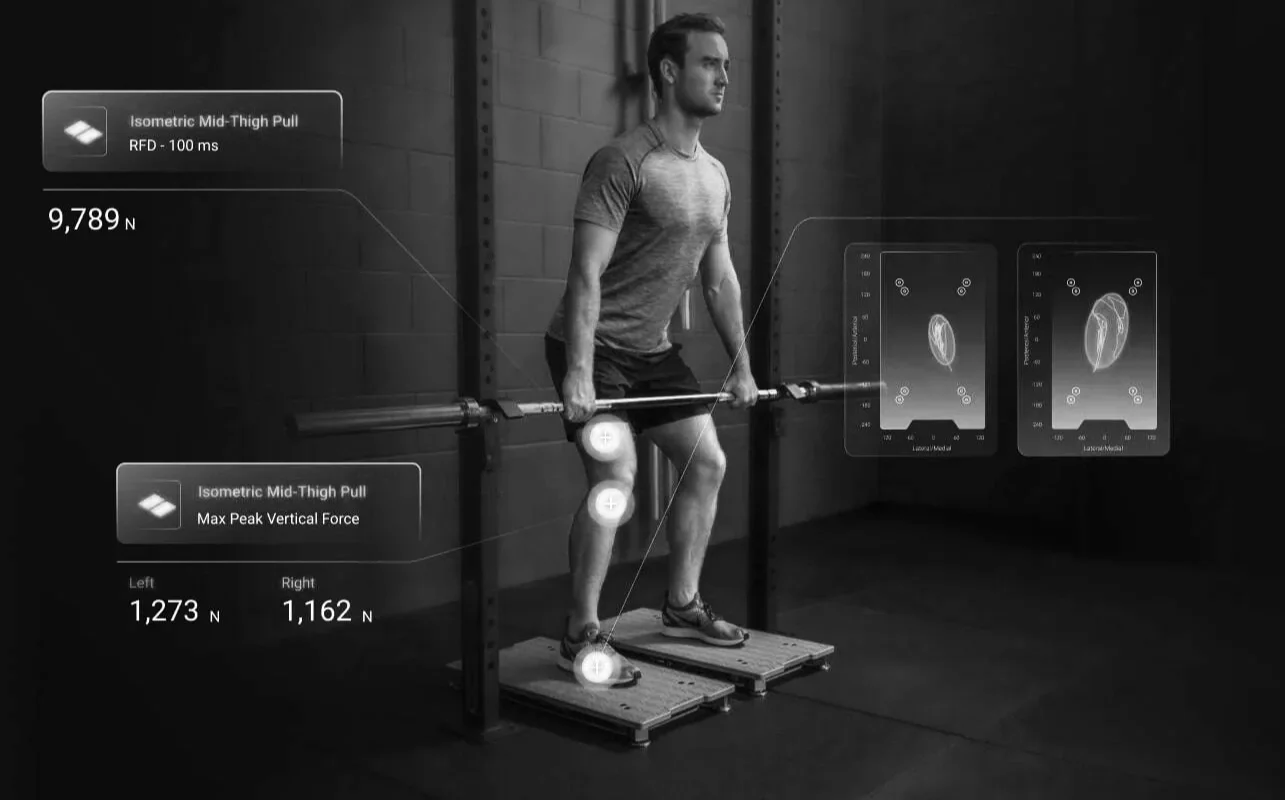 A man performing a barbell squat exercise in a gym, with digital overlays showing force and energy measurements on his legs.