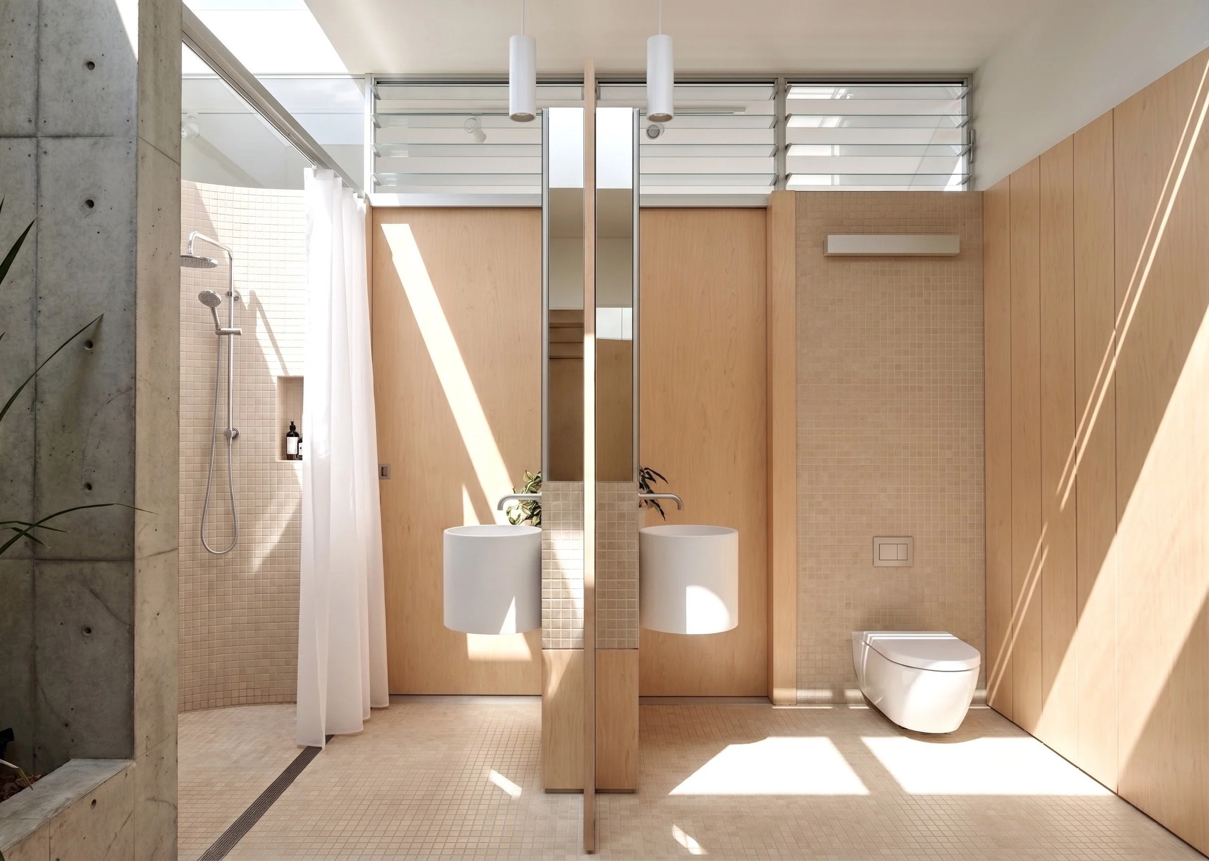 DESIGNS FOR BATHROOMS THAT BREATHE AND INVITE TO LINGER