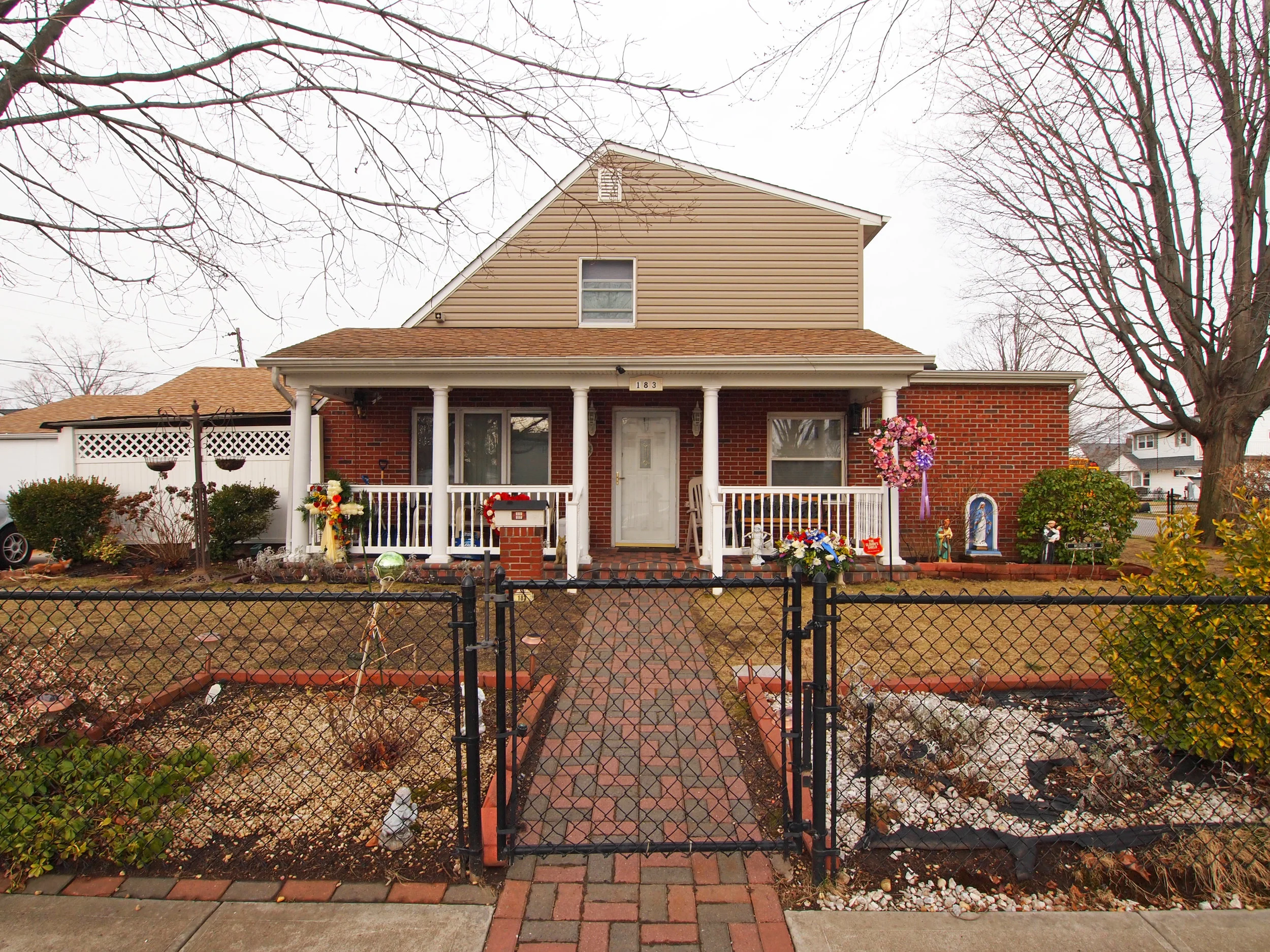 Figure 1. A creative, probably amateur, adaptation of a “little box” in Levittown, Long Island, New York, 2014. Photograph by Matthew Gordon Lasner.