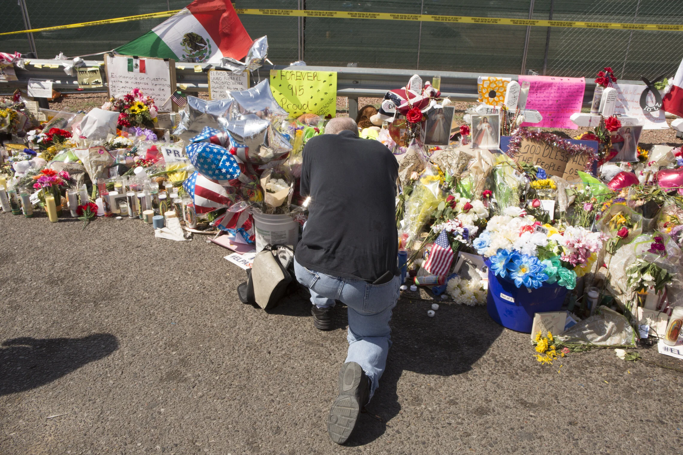 Figure 2: Mourning after the El Paso mass shooting. Photo by Peter Svarzbein.