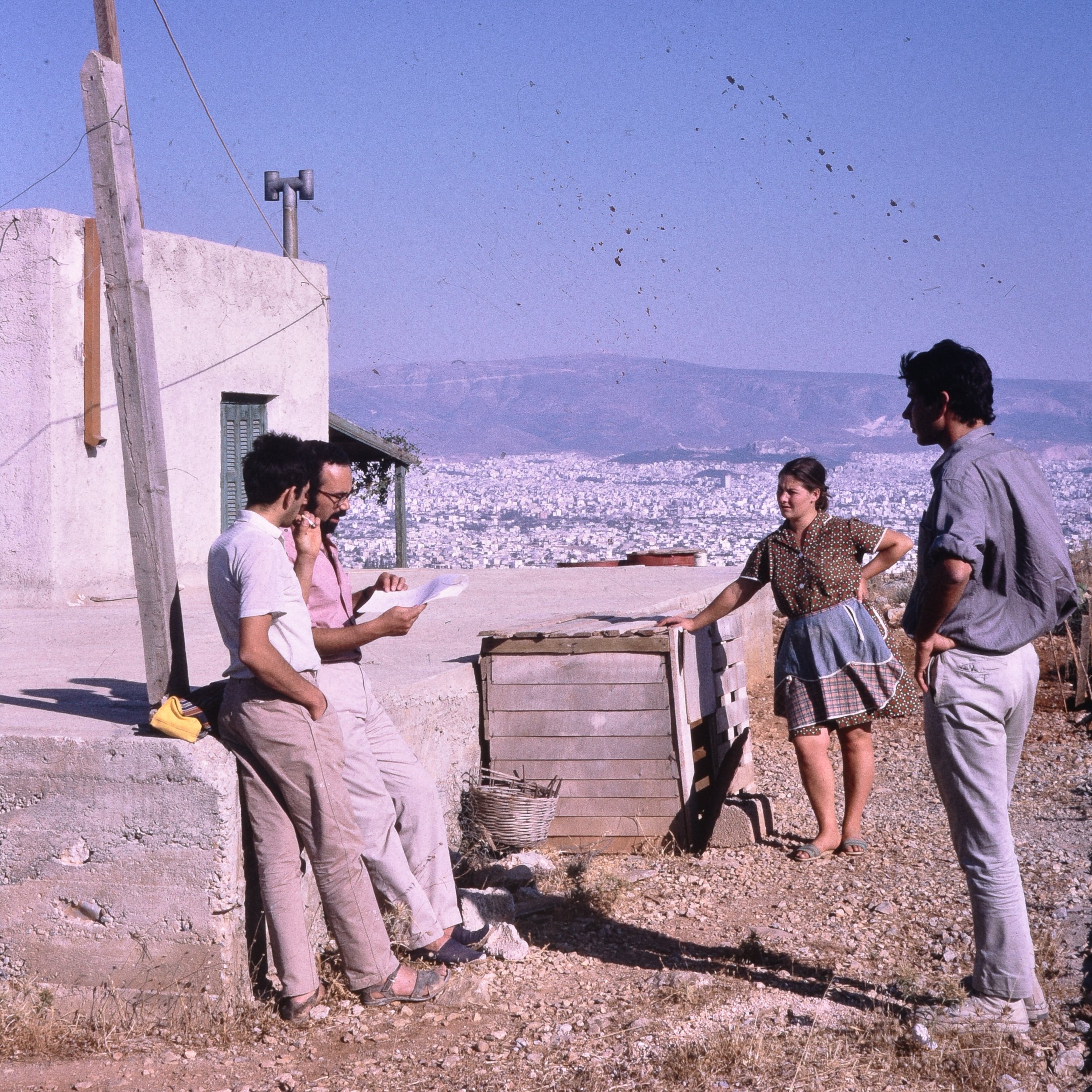  Figure 9. Aristedes Romanos with students and residents at  Kipoupolis , shot during the AA summer studio in 1969. Reproduced with permission of Aristedes and Maria Romanos. 