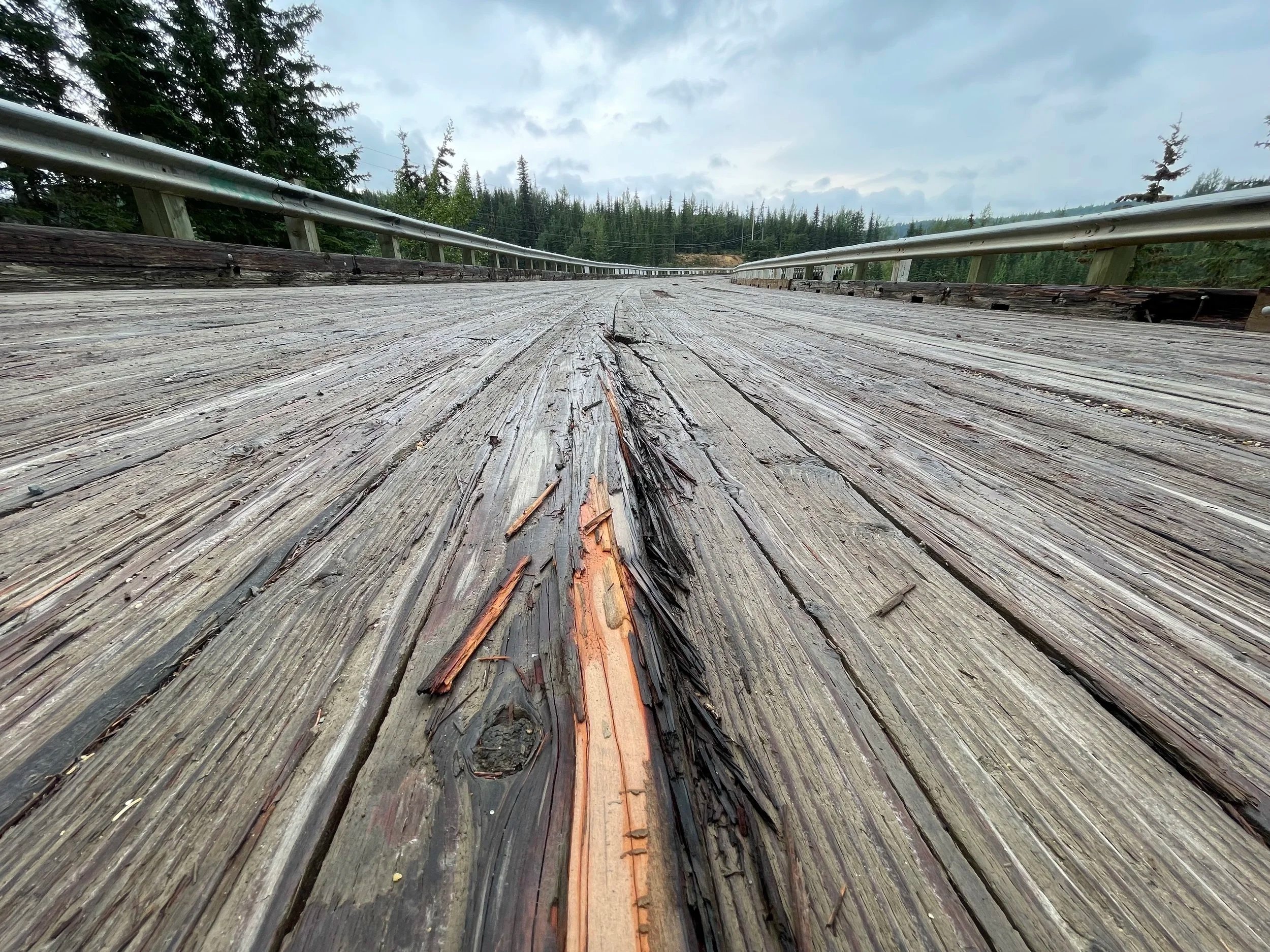  Figure 1. Wood splinters along its grain on the Old Kiskatinaw Bridge, British Columbia, Canada. It cleaves forming voids, cracks, and fissures. Photograph by Desiree Valadares, 2023. 