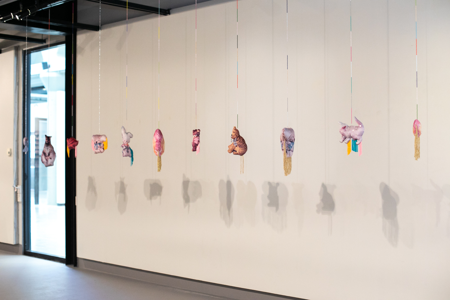  Holly Leonardson, 2019, found images digitally printed on velvet, wool stuffed, polyester fringing, glass beads, craft materials, dimensions variable.  Photography by Mel De Ruyter  