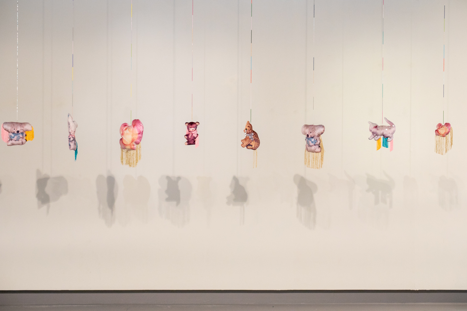  Holly Leonardson, 2019, found images digitally printed on velvet, wool stuffed, polyester fringing, glass beads, craft materials, dimensions variable.  Photography by Mel De Ruyter  