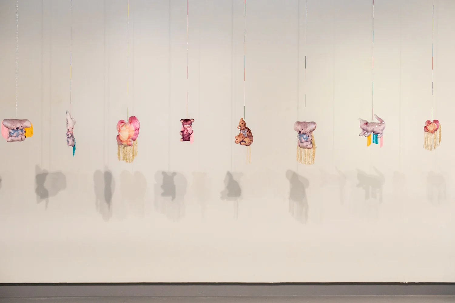 Holly Leonardson, 2019, found images digitally printed on velvet, wool stuffed, polyester fringing, glass beads, craft materials, dimensions variable. Photography by Mel De Ruyter