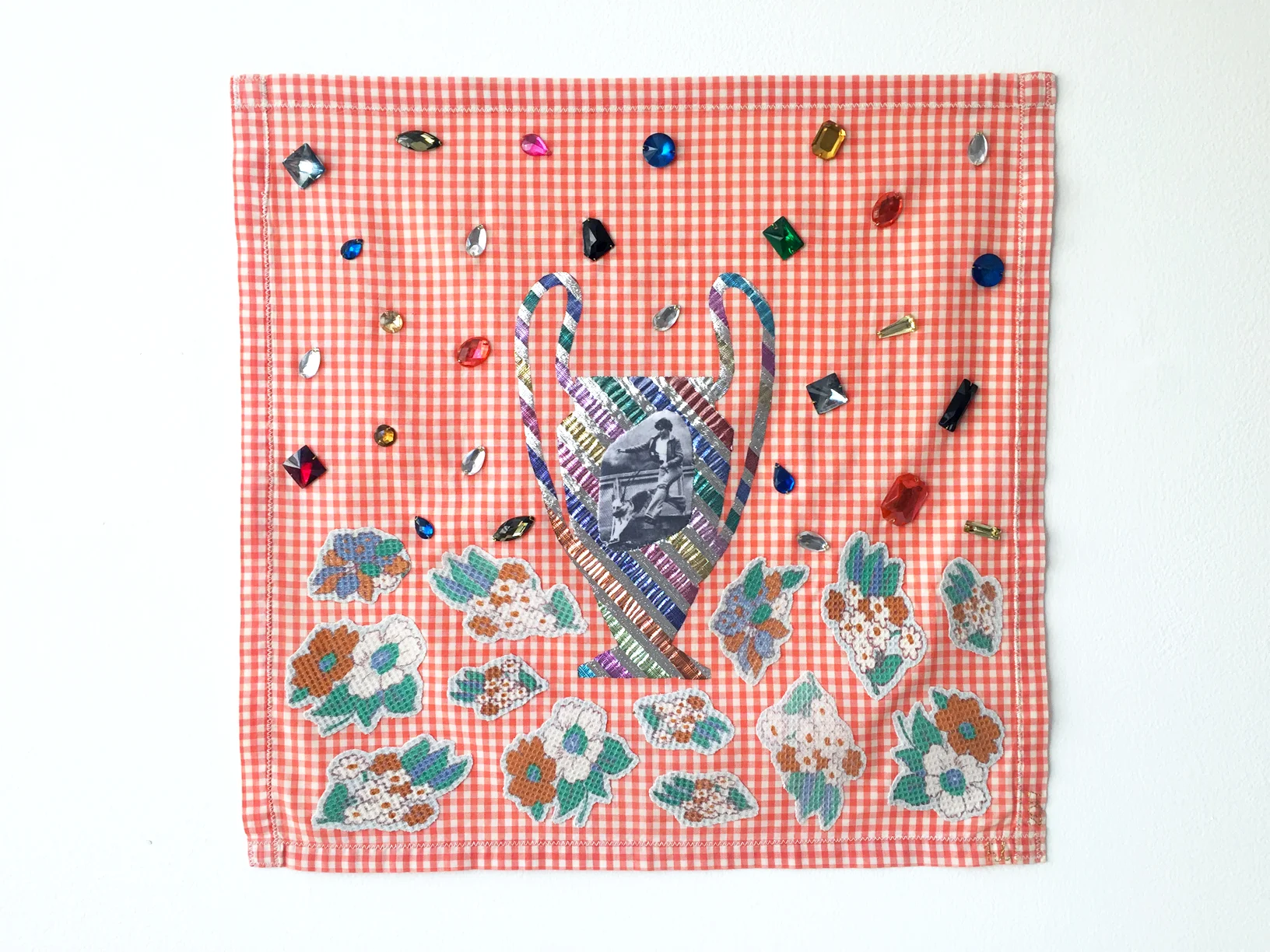 Number 1 Best Friend #4, 2017, textile object, found fabric on handmade cotton placemat, digital print on cotton, polyester, found plastic gems, 395mm x 385mm