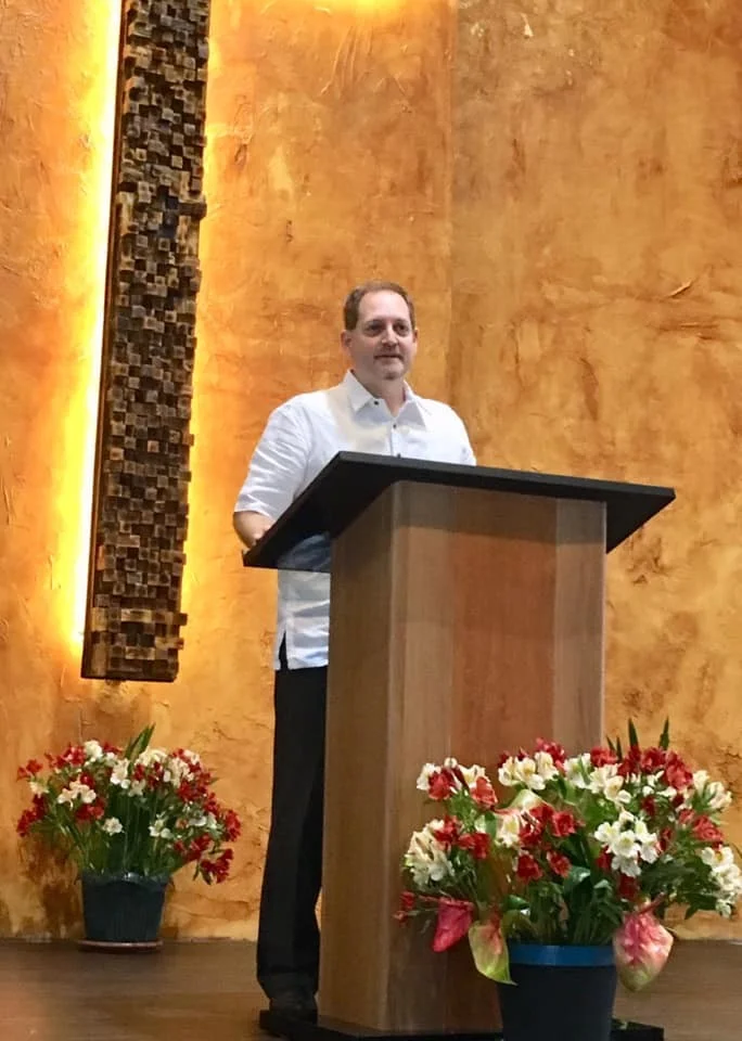 Preaching the Sunday morning service at Guiding Light Christian Church in Baguio City.