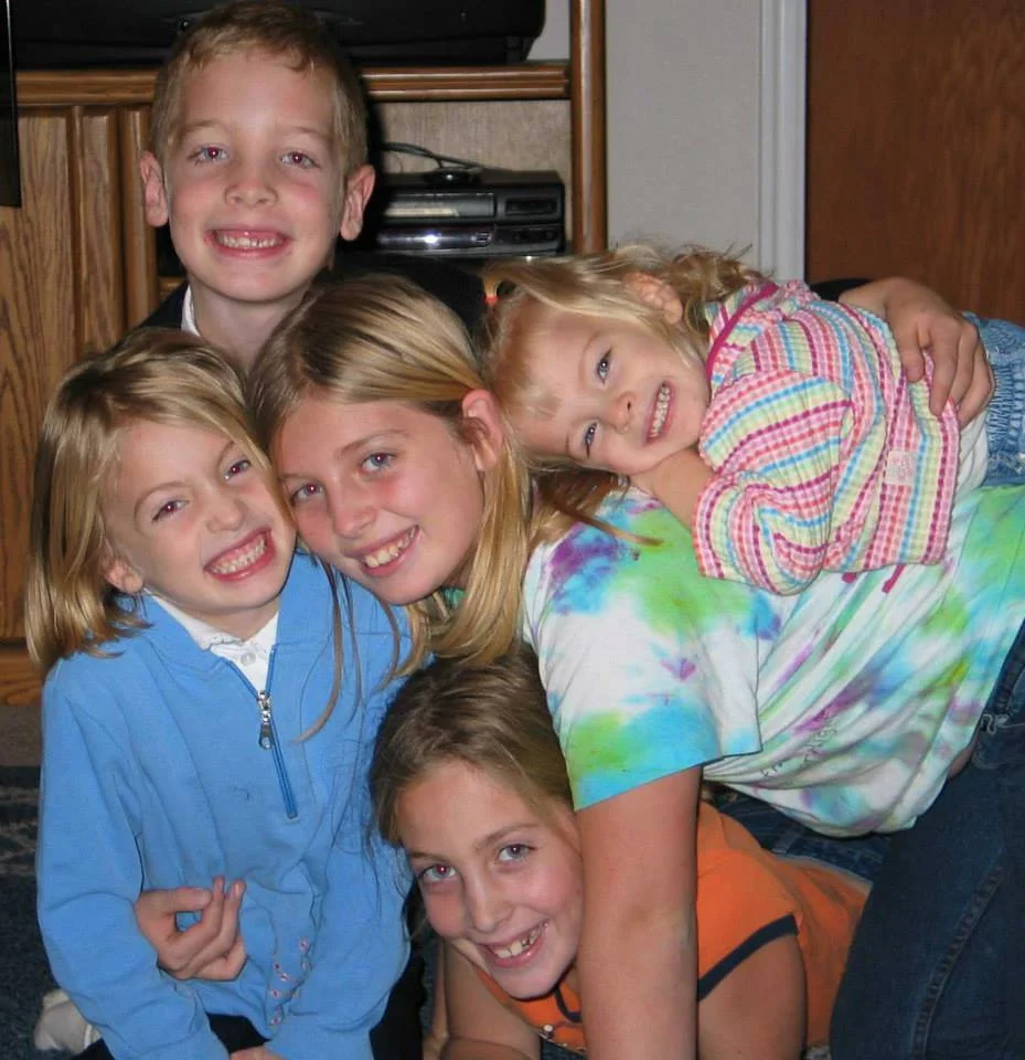 kid dog pile.jpg