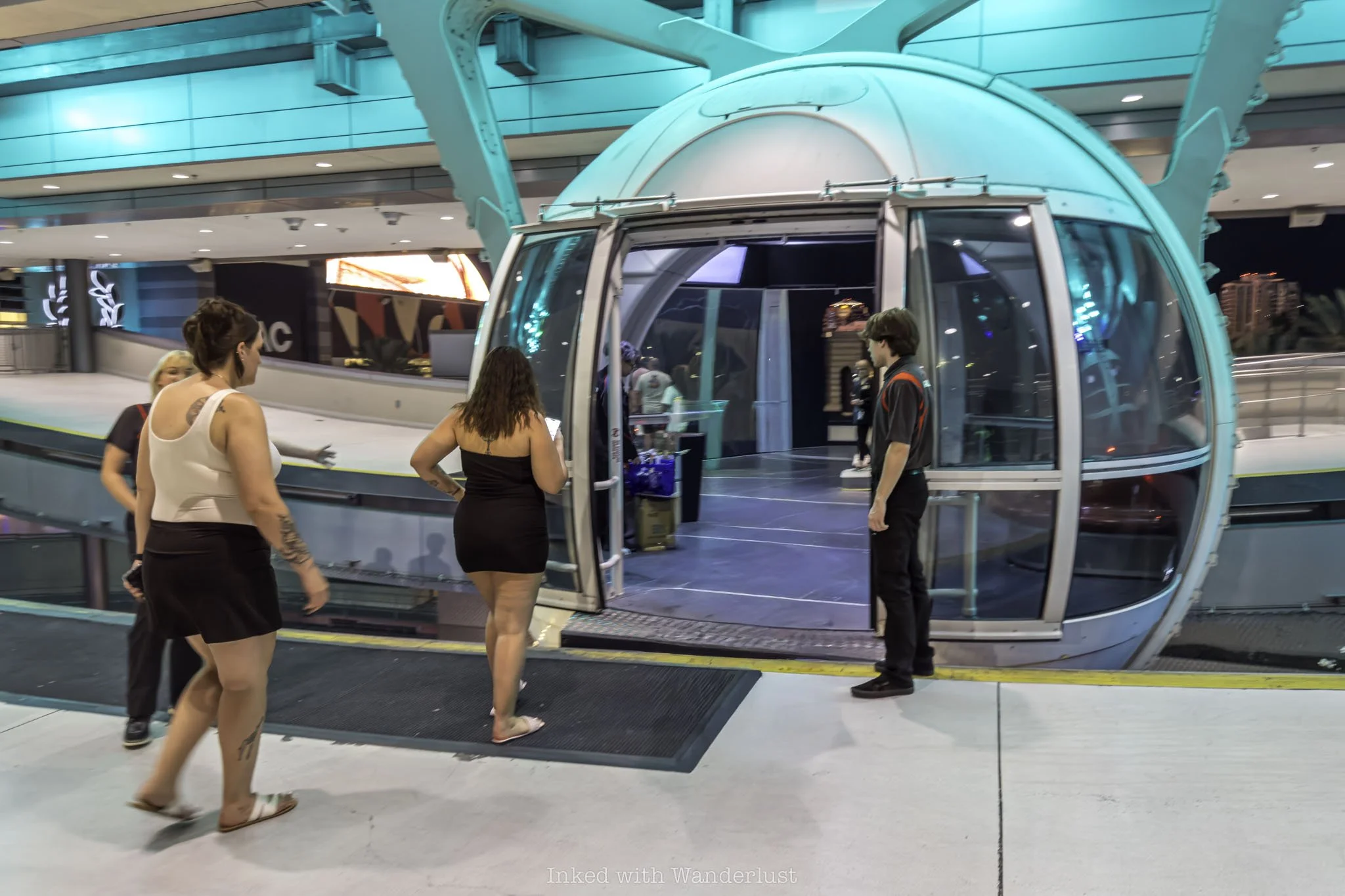 People walking into a High Roller cabin.