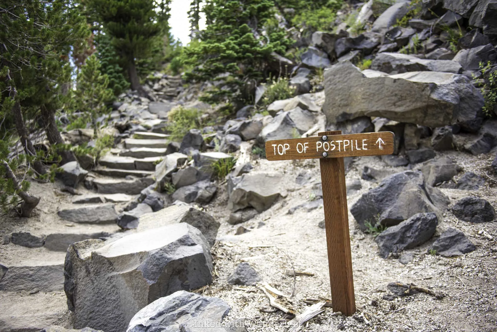 Trail signage pointing the way to the top of Devils Postpile.