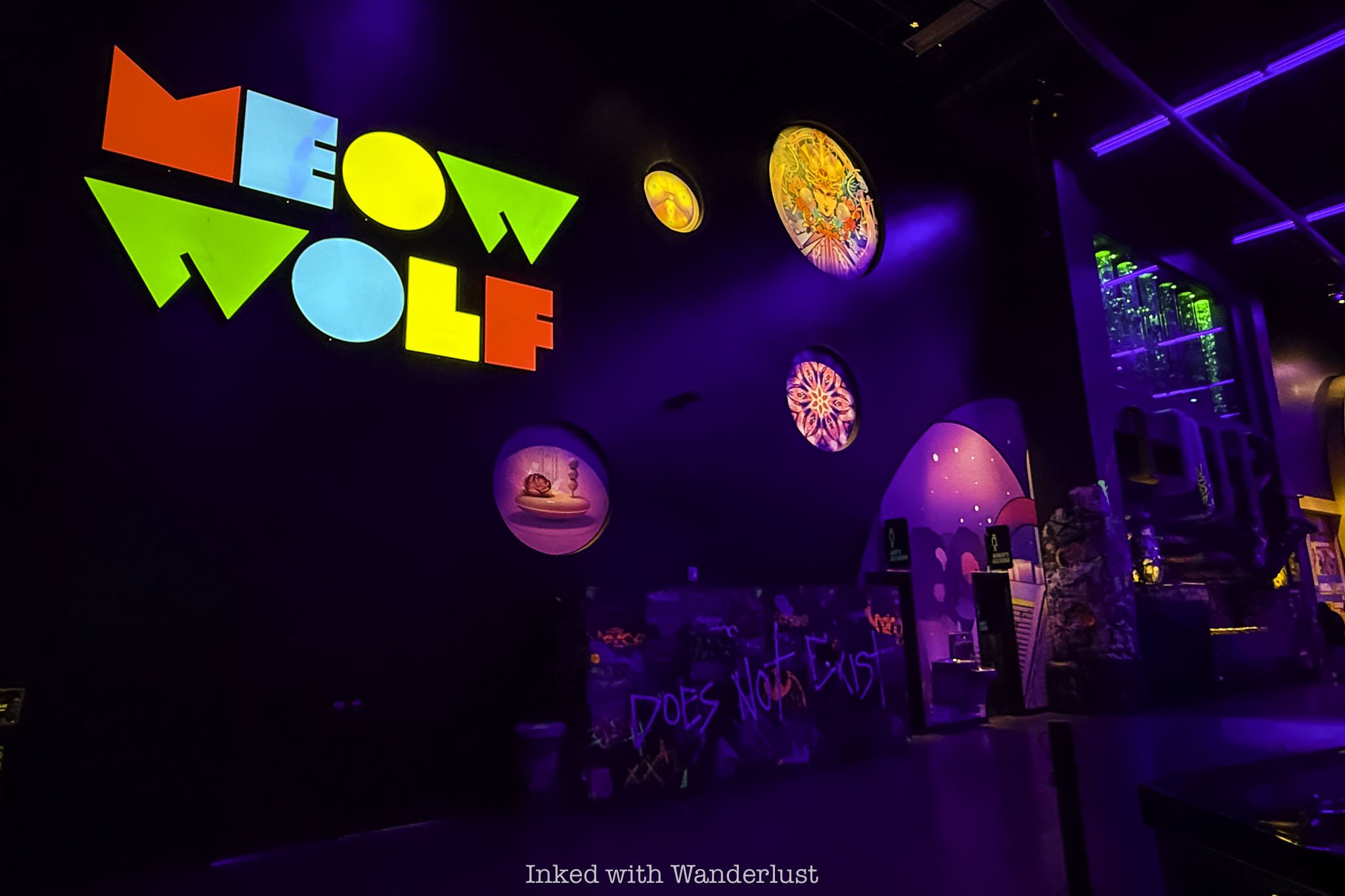 A Meow Wolf sign inside the Area 15 building.