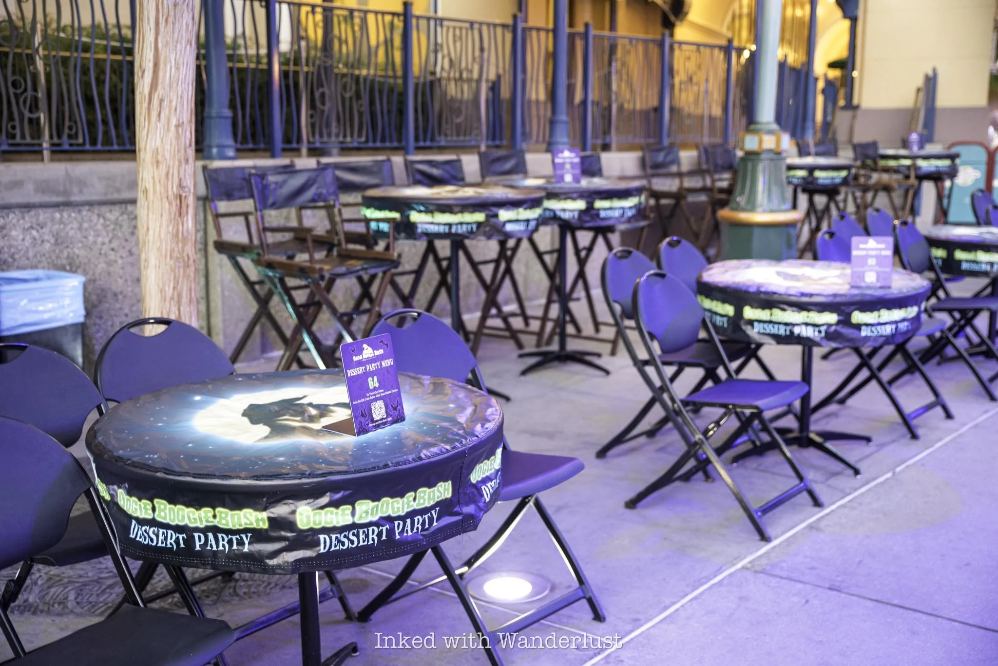 The seating tables at Oogie Boogie Bash dessert party.