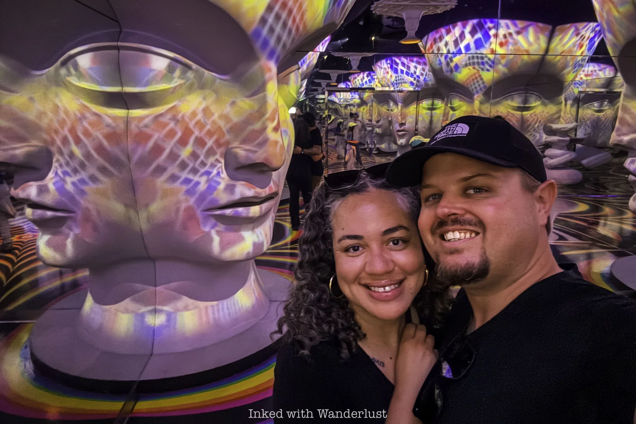Two people exploring Meow Wolf Omega Mart in Las Vegas.