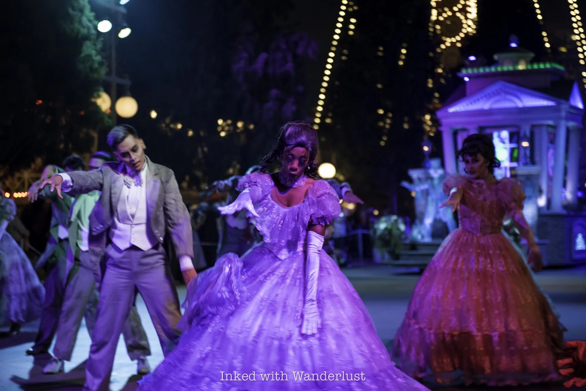 Performers during the Frightfully Fun Parade at Oogie Boogie Bash in Disney California Adventure.