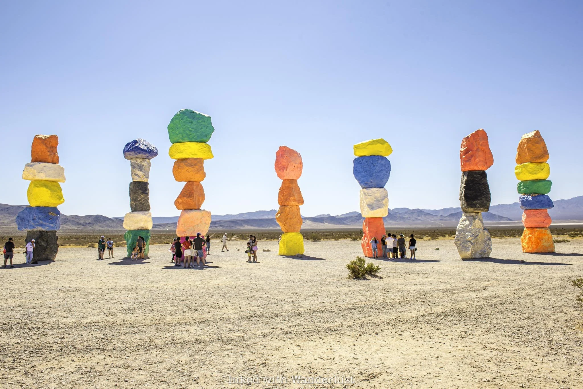 A wide shot of the Seven Magic Mountains near Las Vegas.