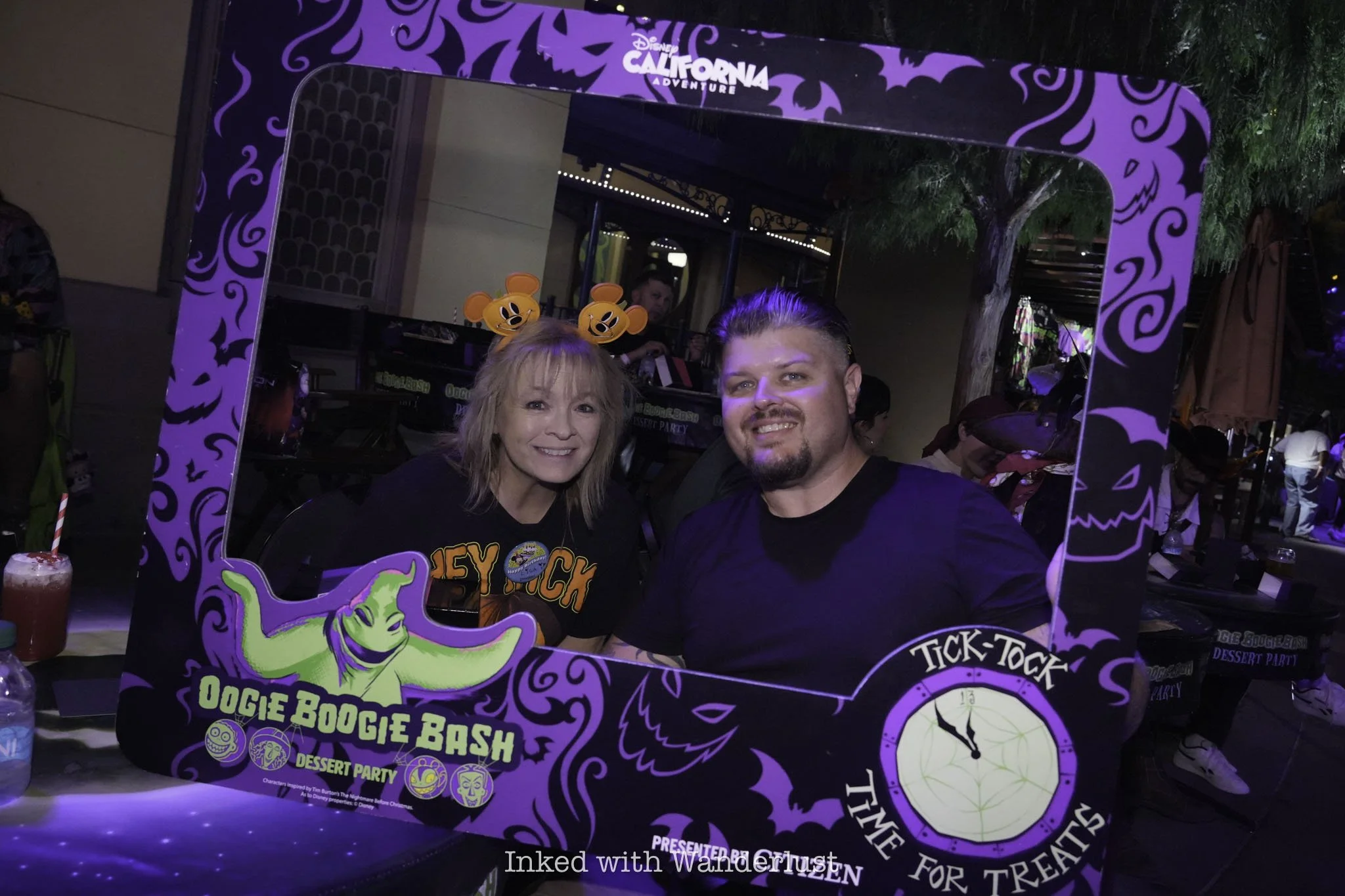 Guests enjoying Oogie Boogie Bash parade while at the dessert party.