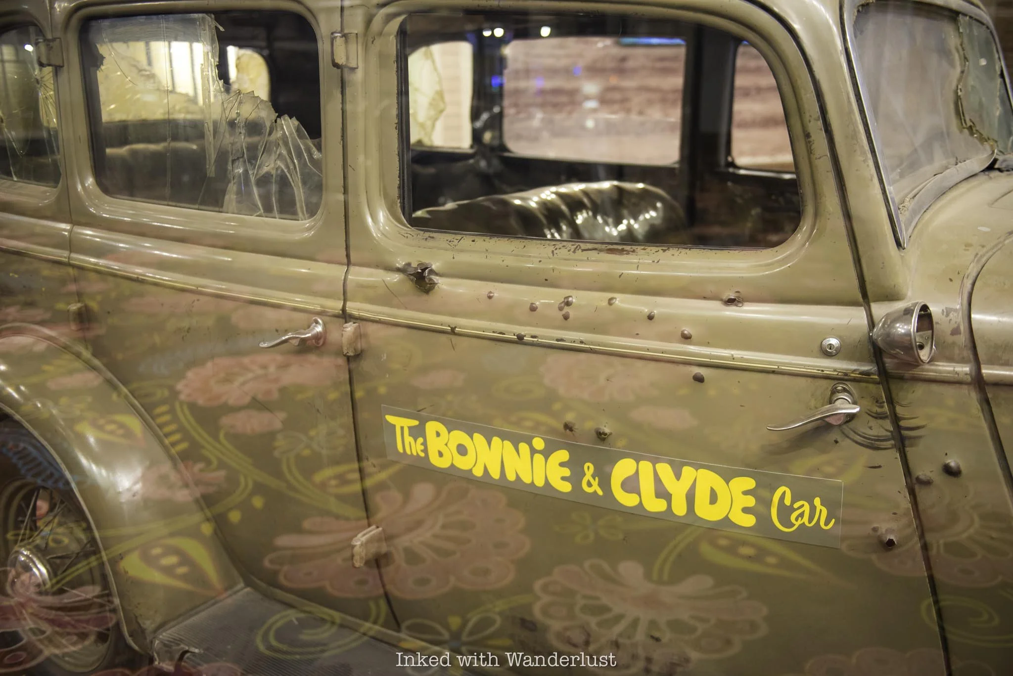 The bullet exit holes on the passenger side of the Bonnie and Clyde death car.