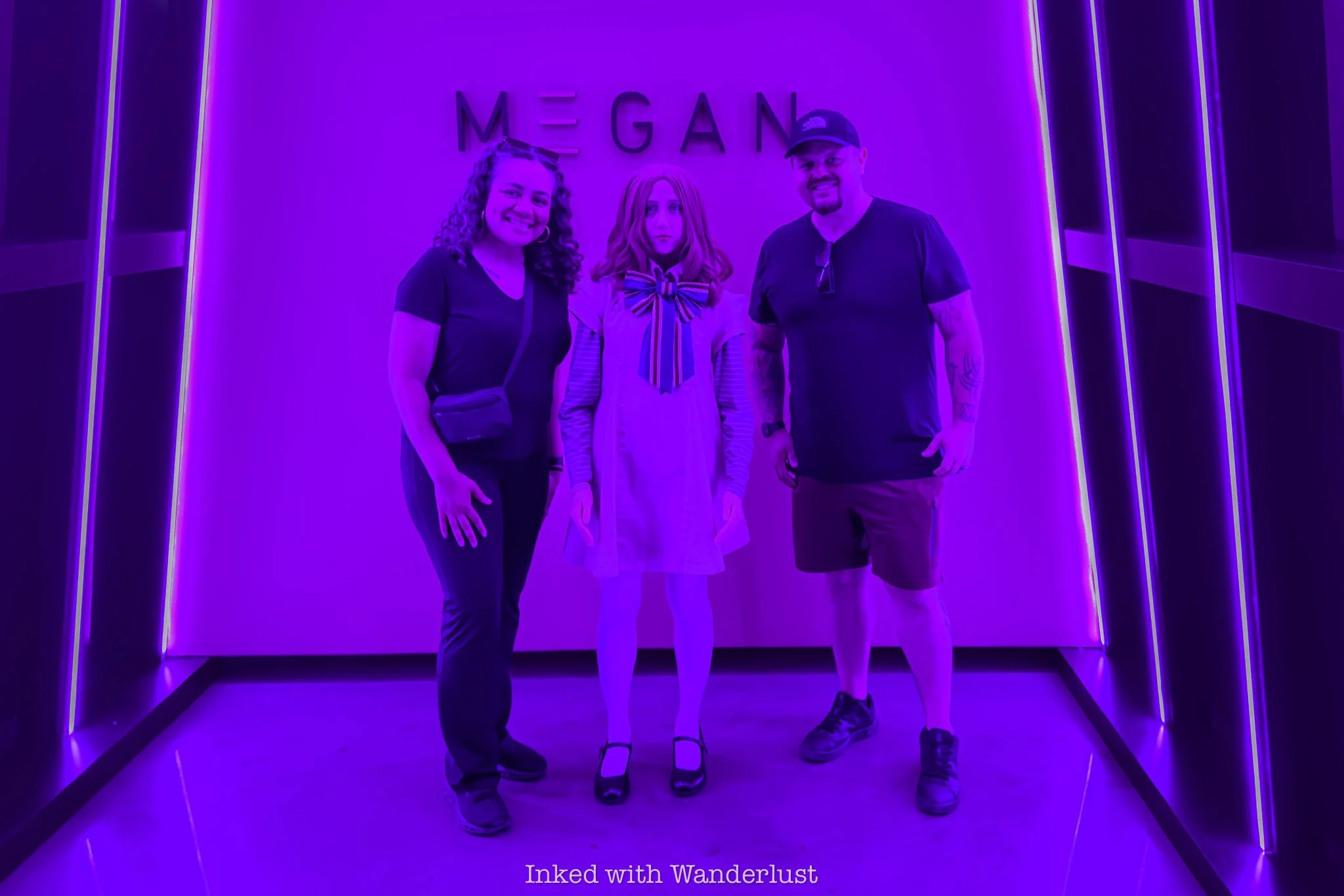 Megan posing for photos with guests at Universal Horror Unleashed.