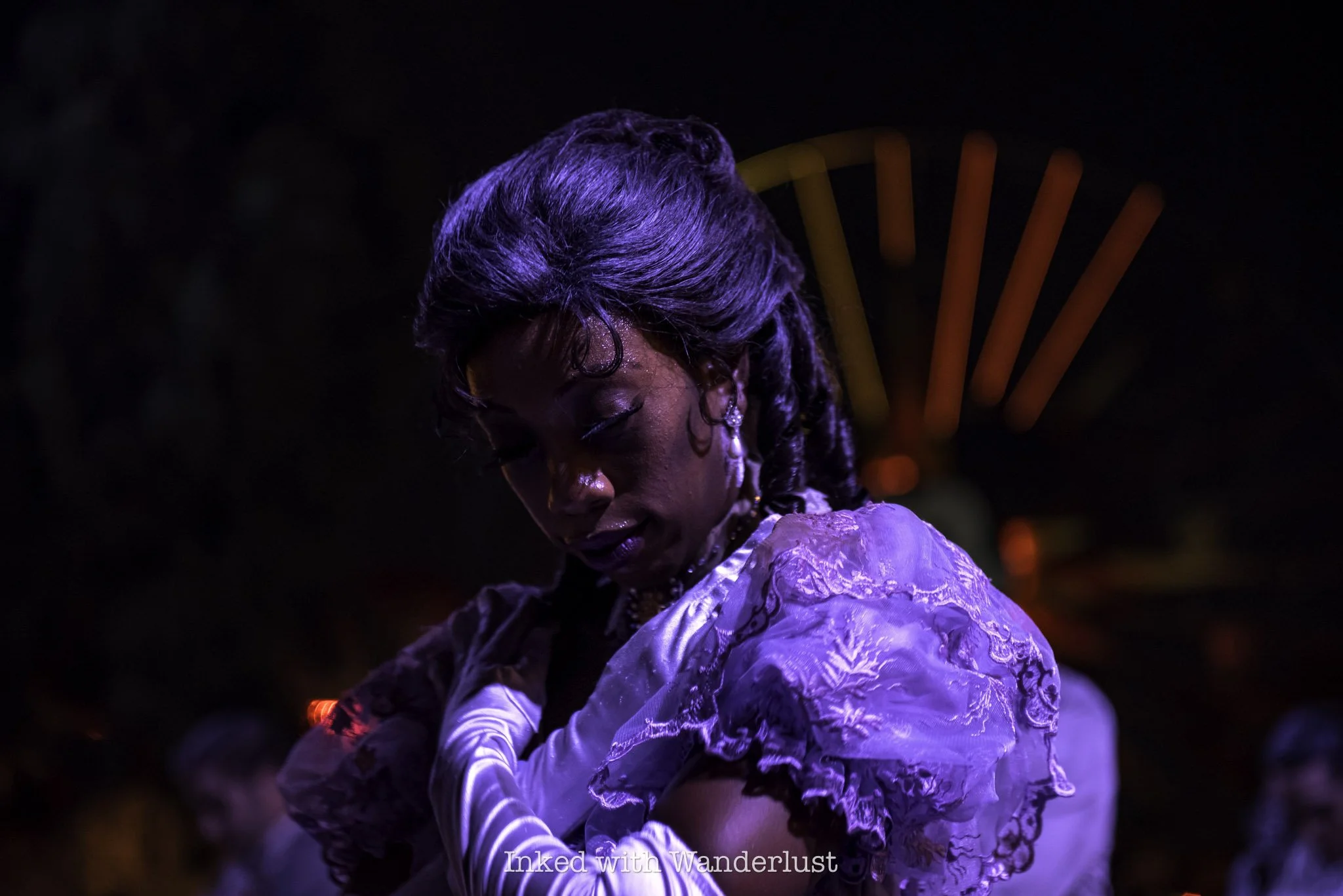 A performer posing during Oogie Boogie Bash parade.