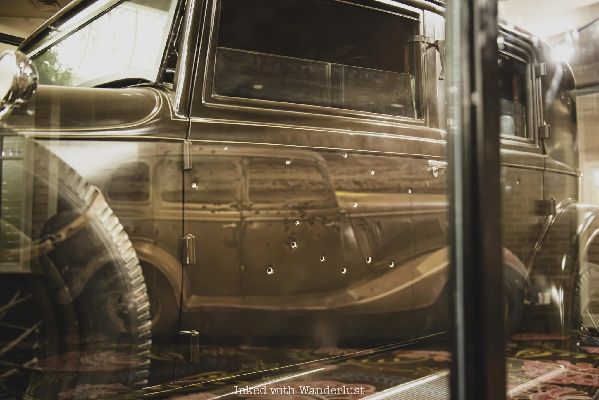 The bullet-ridden armored car owned by Dutch Shultz on display.