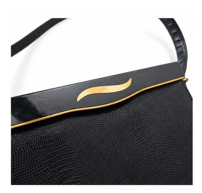 black_handbag_hardware_detail.jpeg