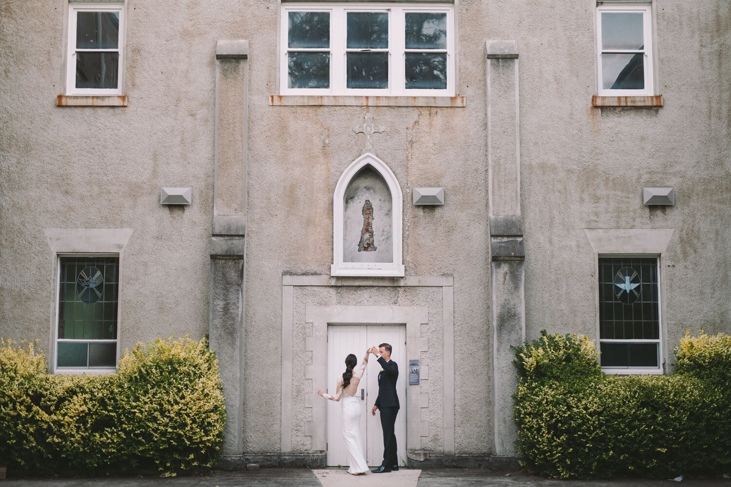 Abbotsford Convent Wedding Photo in front of building