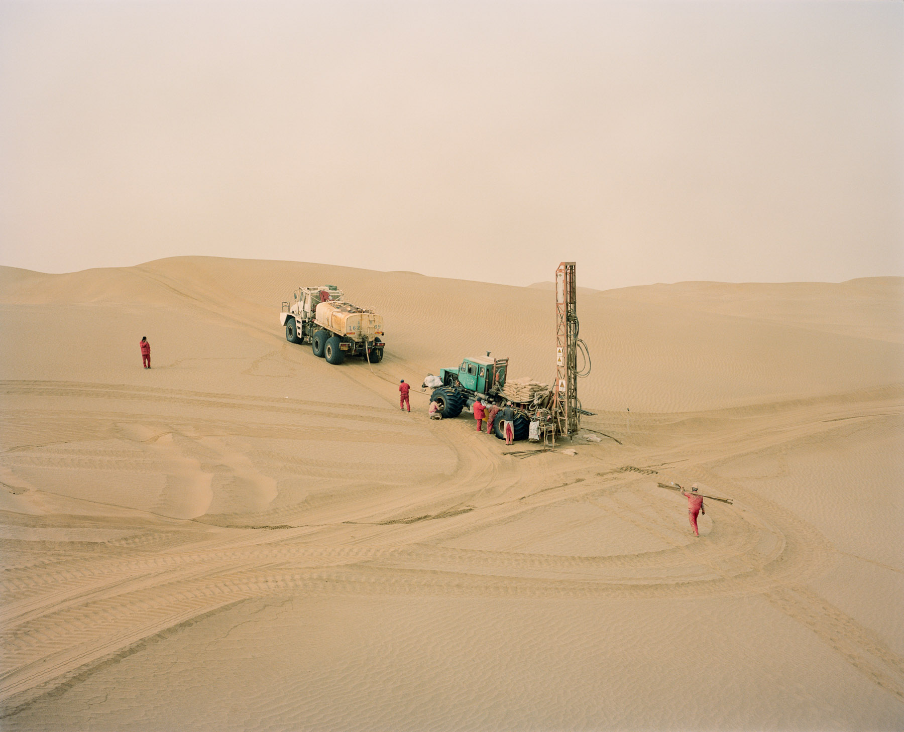  December 2016. Xinjiang province, China. Oil exploration team from CNPC - China National Petroleum Corporation - operating in the Taklamakan desert in the province of Xinjiang. This team and a few others are setting up thousands of explosive charges