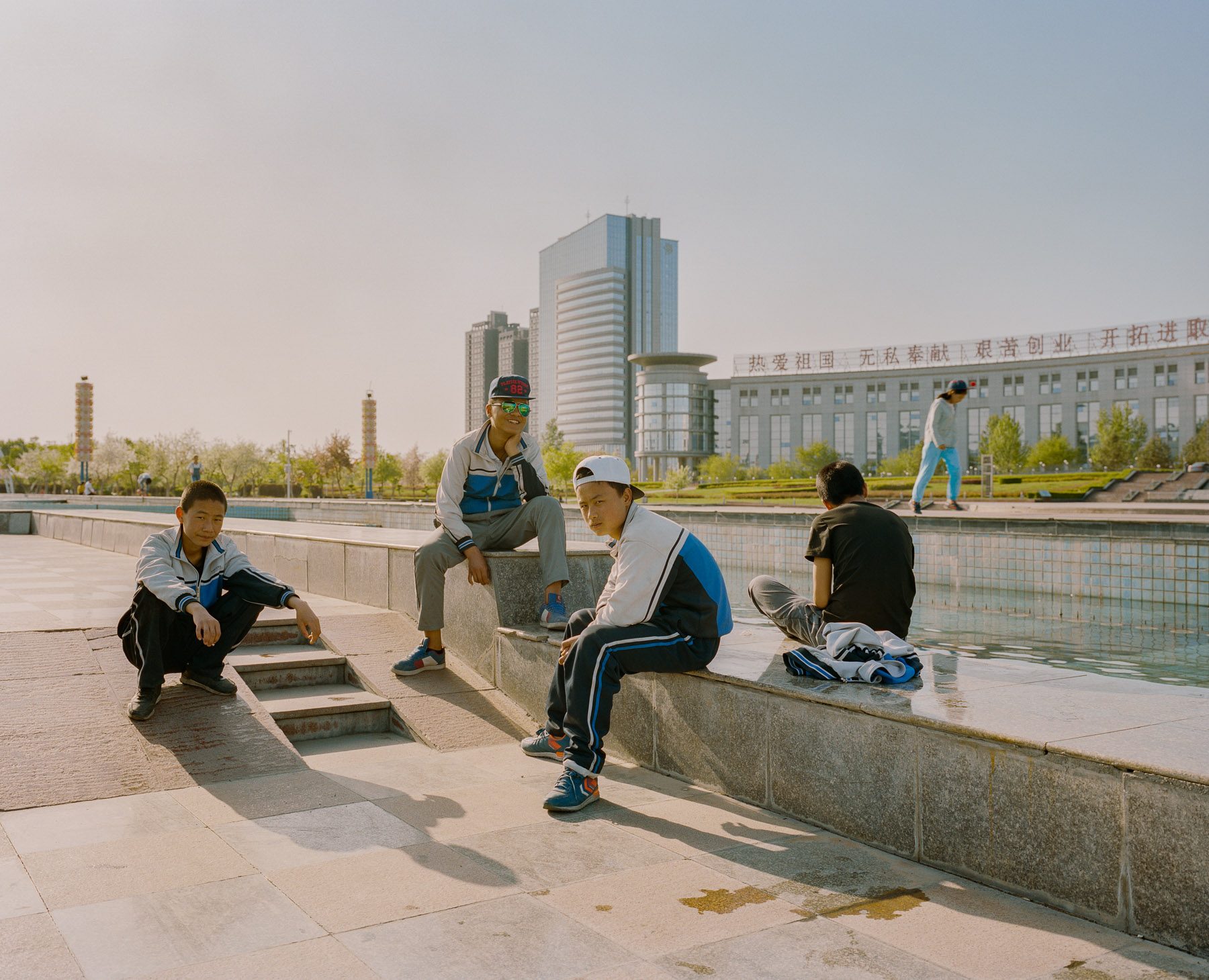  May 2017. Xinjiang province, China. local youth in a parc after school in the city of Shihezi in the Northern part of the Xinjiang province.  