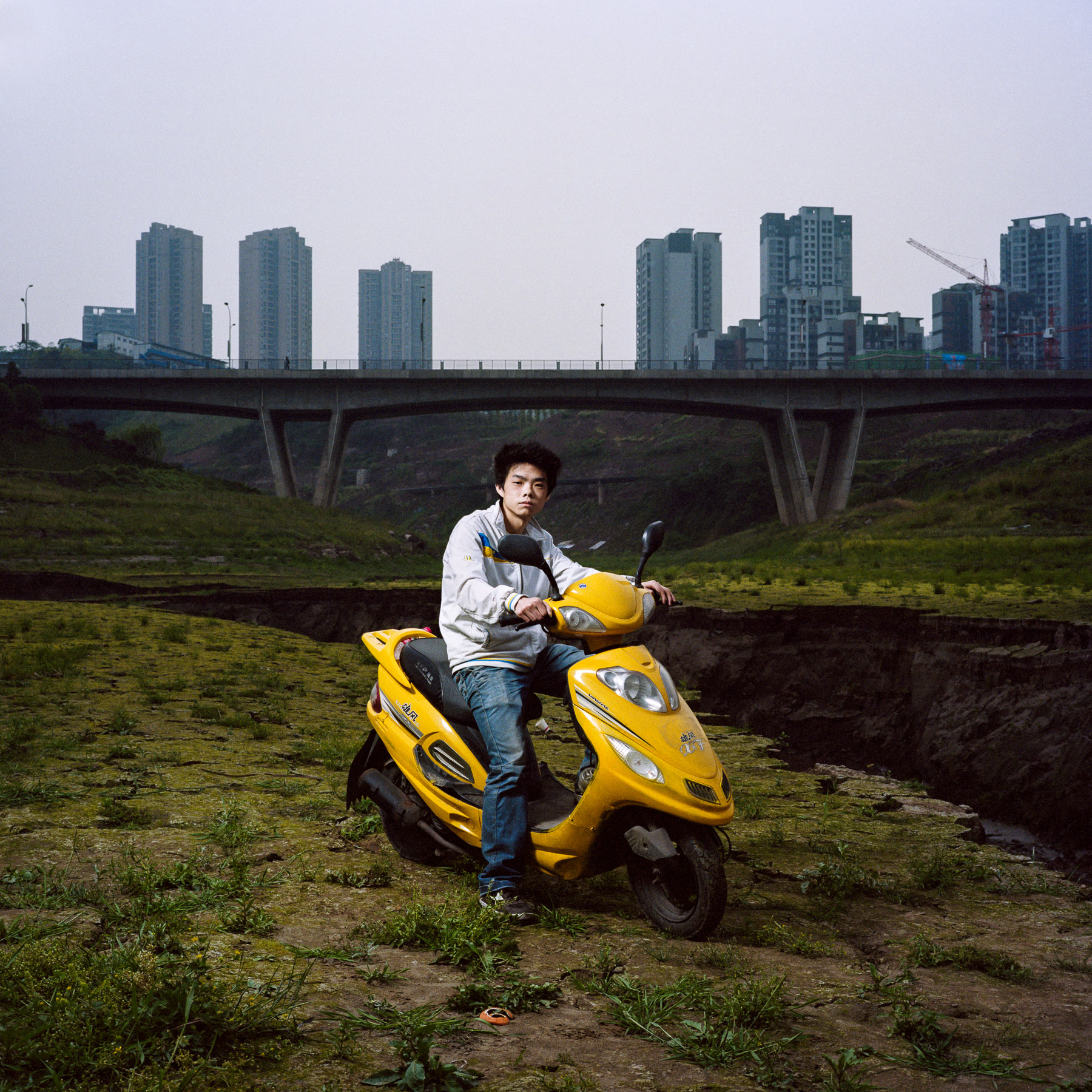  Chongqing, China. 2013. Chongqing is a major city in the Southwest of China and one of the five national central cities in the PRC. It is one of PRC's four direct-controlled municipalities and was created as such in 1997. It has a population of 28 m
