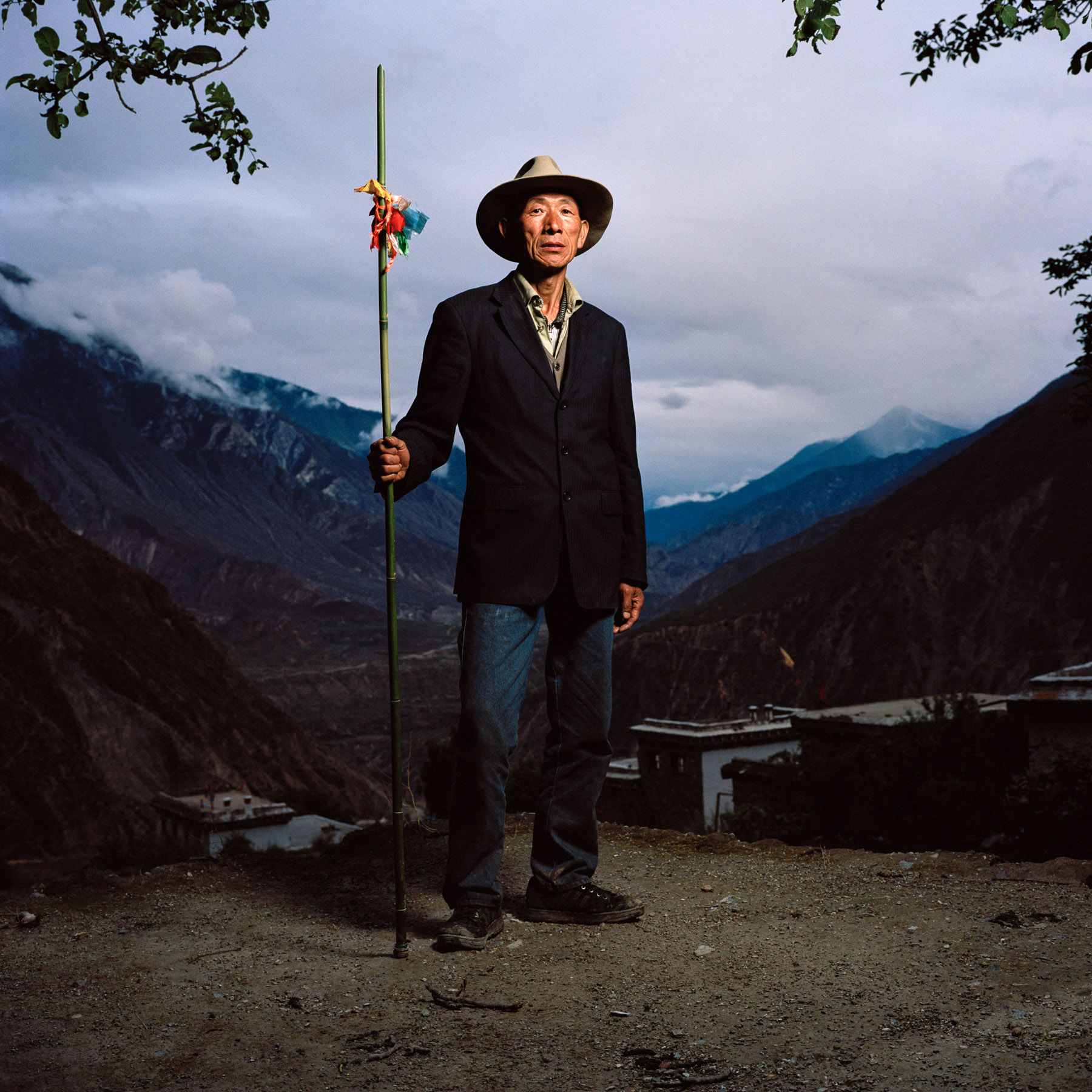  May 2012. Tibet province, China. Portrait of Jiangzu, 59 years old, Tibetan forest ranger near the village of Zina Yongpo at 2150m high, on the trail of the buddhist pilgrimage of the Kawa Karpo. 