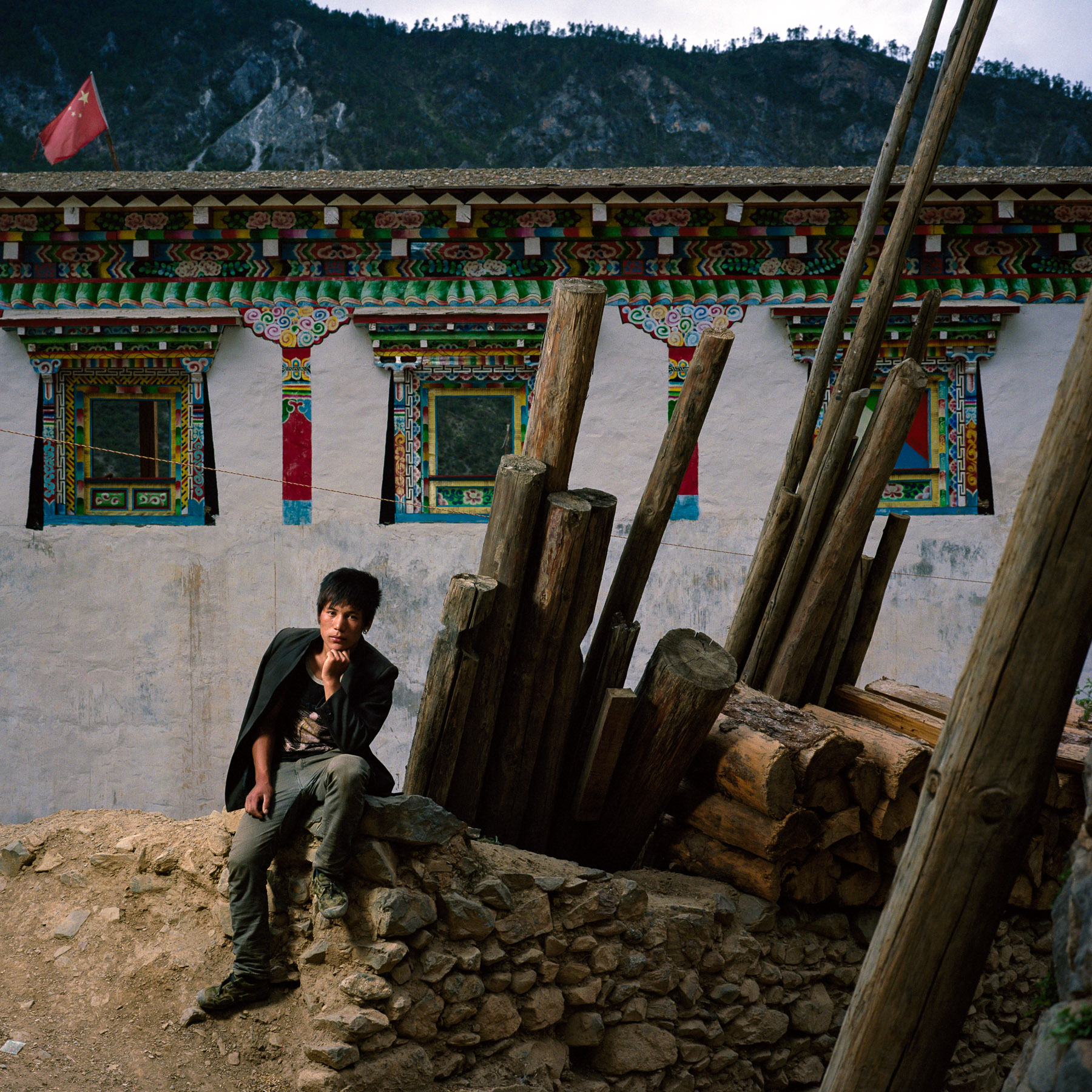  May 2012. Yunnan province, China. Portrait of Gesan Siri, Tibetan, 20 years old in the village of Aben on the trail of the buddhist pilgrimage of the Kawa Karpo. 
