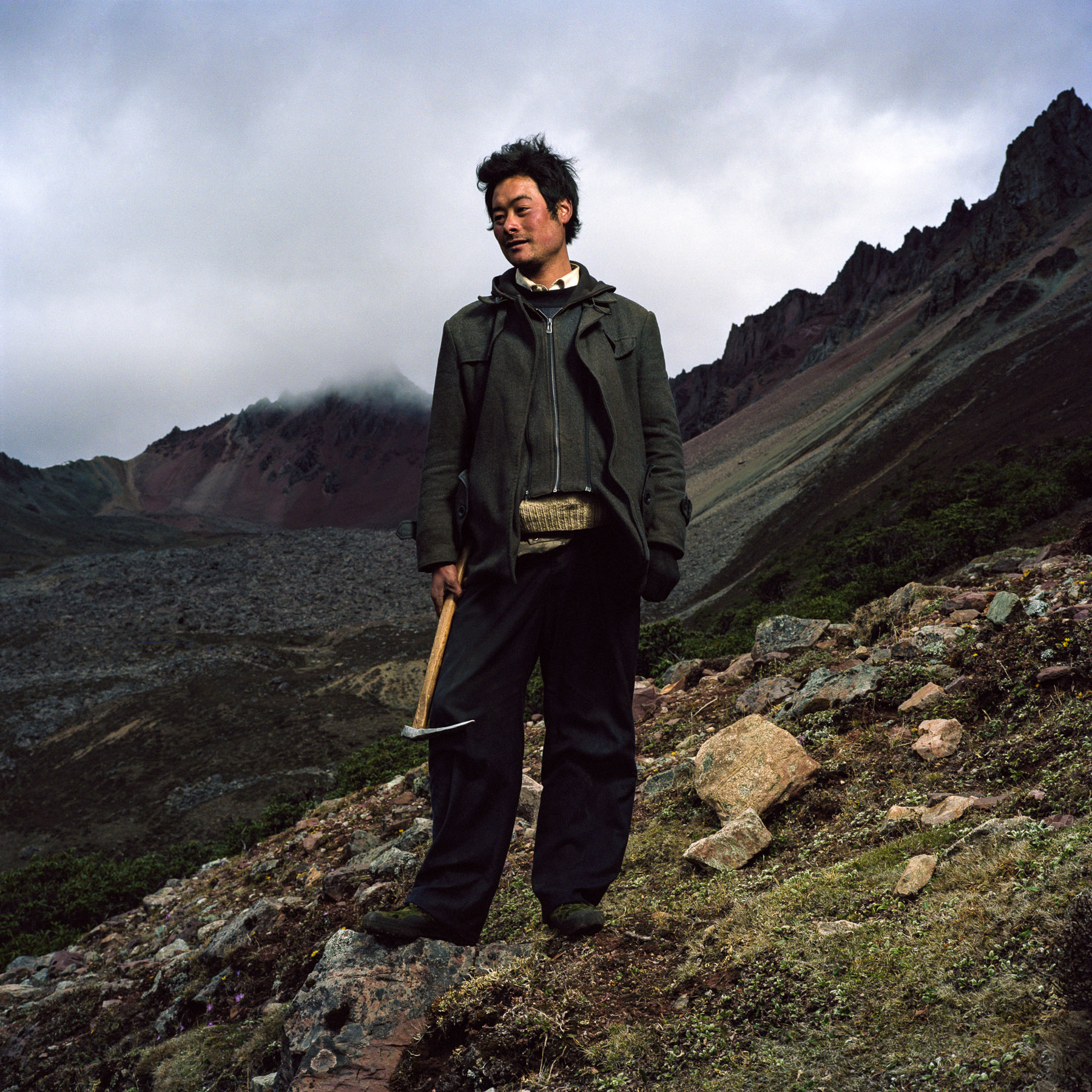  May 2012. Tibet province, China. Portrait of a Tibetan caterpillar fungus picker near the Shola Pass basecamp at 4470m high on the trail of the buddhist pilgrimage of the Kawa Karpo. 