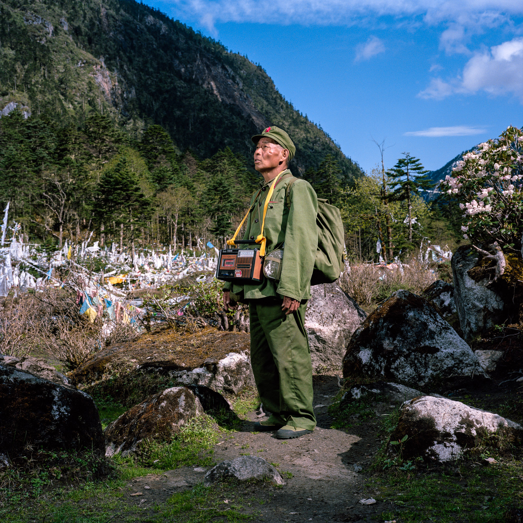 May 2012. Yunnan province, China. Professional Tibetan pilgrim (trekking around the sacred Kawa Karpo mountain on behalf of other Tibetans who cannot do it themselves).Location: At the foothill of the Duokela Pass (3600m). on the trail of the buddhi