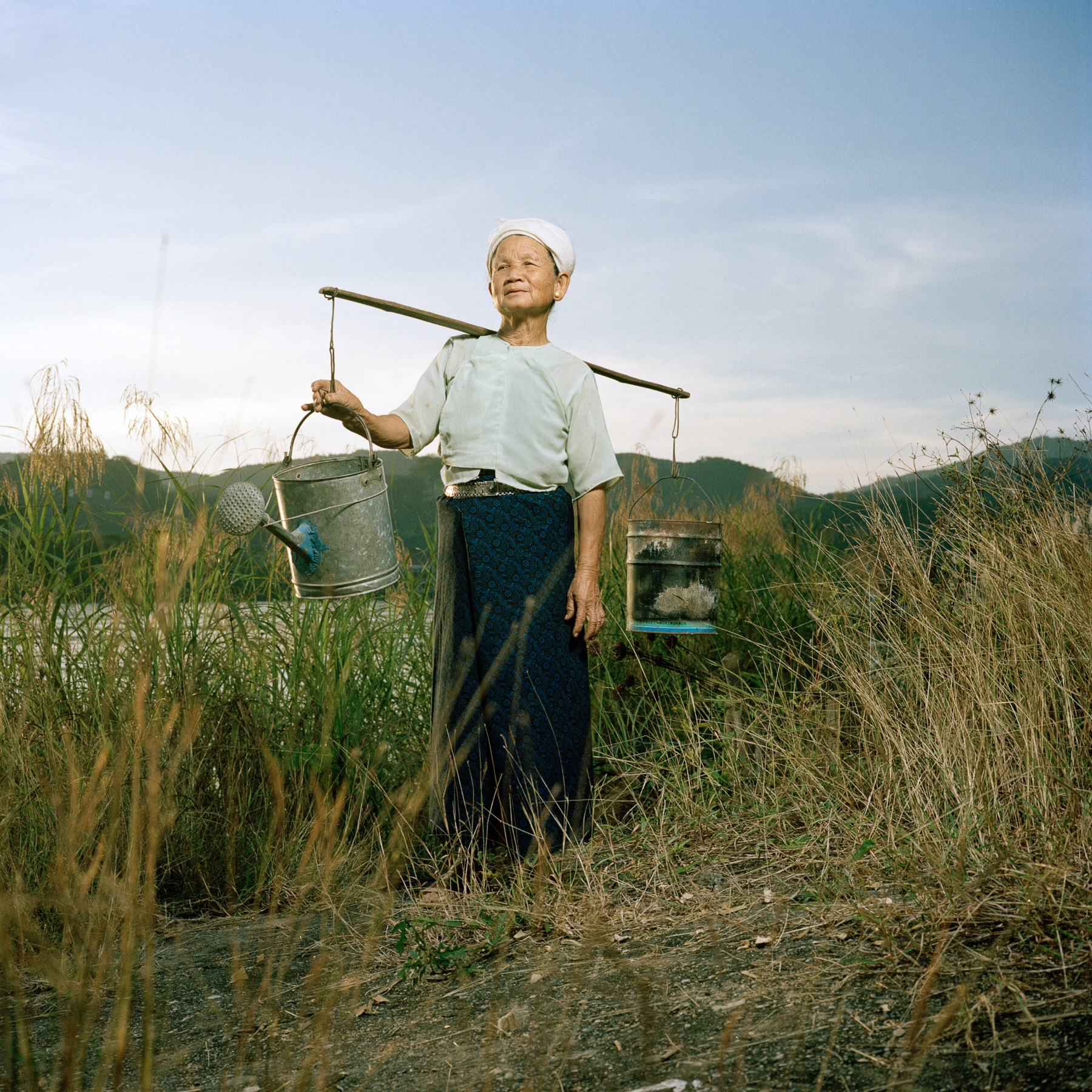  China, Yunnan province. Southern region of Xishuangbanna. old Dai minority woman pictured along the Mekong river. 