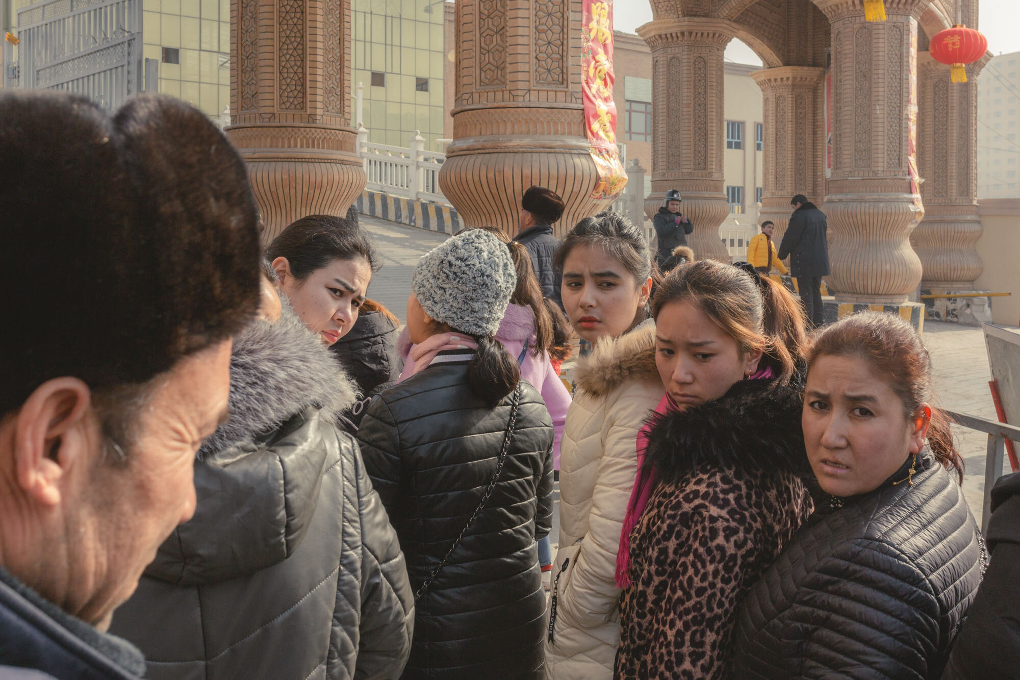  February 3rd 2019. Hotan, Xinjiang province. Uighur-minority locals wait in line for ID check and body searches before entering the local bazar. 