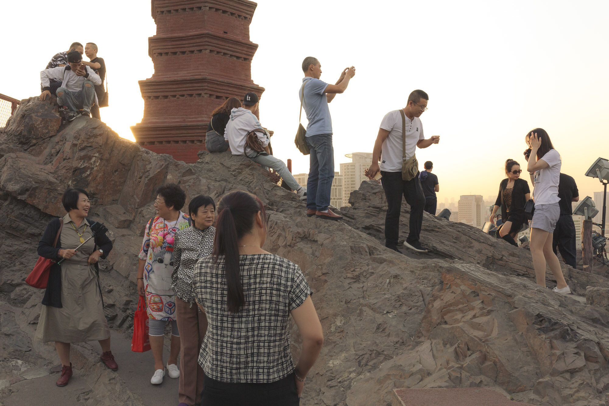  September 24th 2019. Xinjiang province, China. Han Chinese and Uiguur tourists and locals enjoying the views from the heights of Hongshan park in the provincial capital Urumqi. 