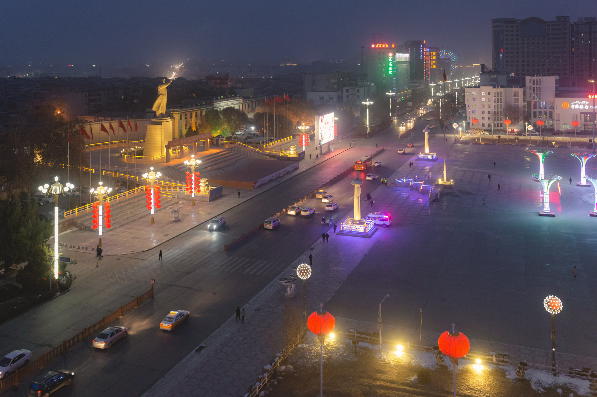  January 31st 2019. Kashgar, Xinjiang province. Night view over People’s Square and the massive Mao statue reigning over it. 