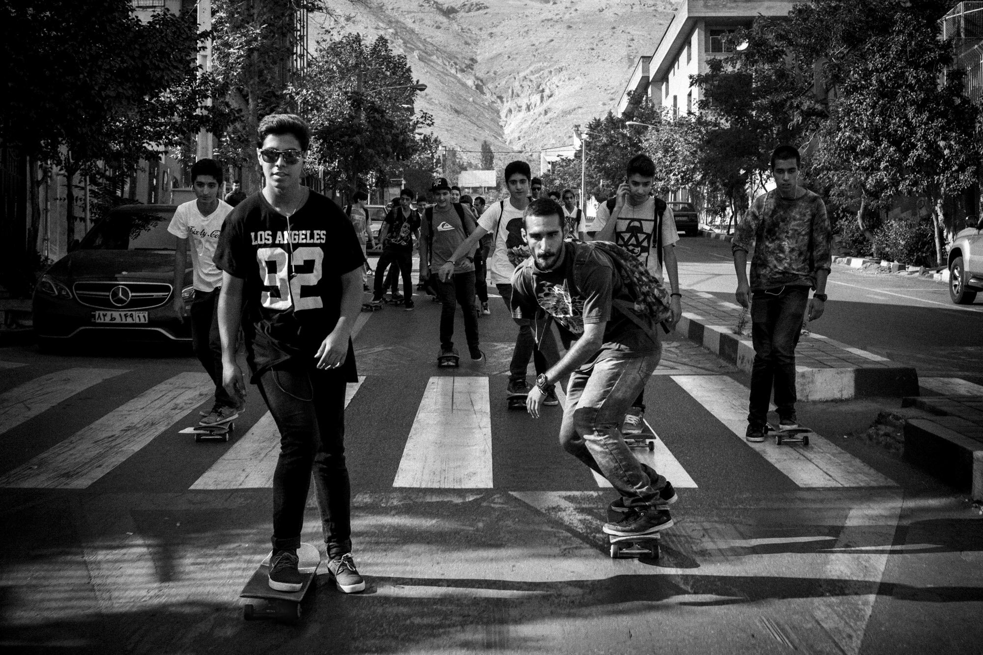  Young Iranians skateboard down Valiasr Street in the north of Tehran on September 21, 2015. 