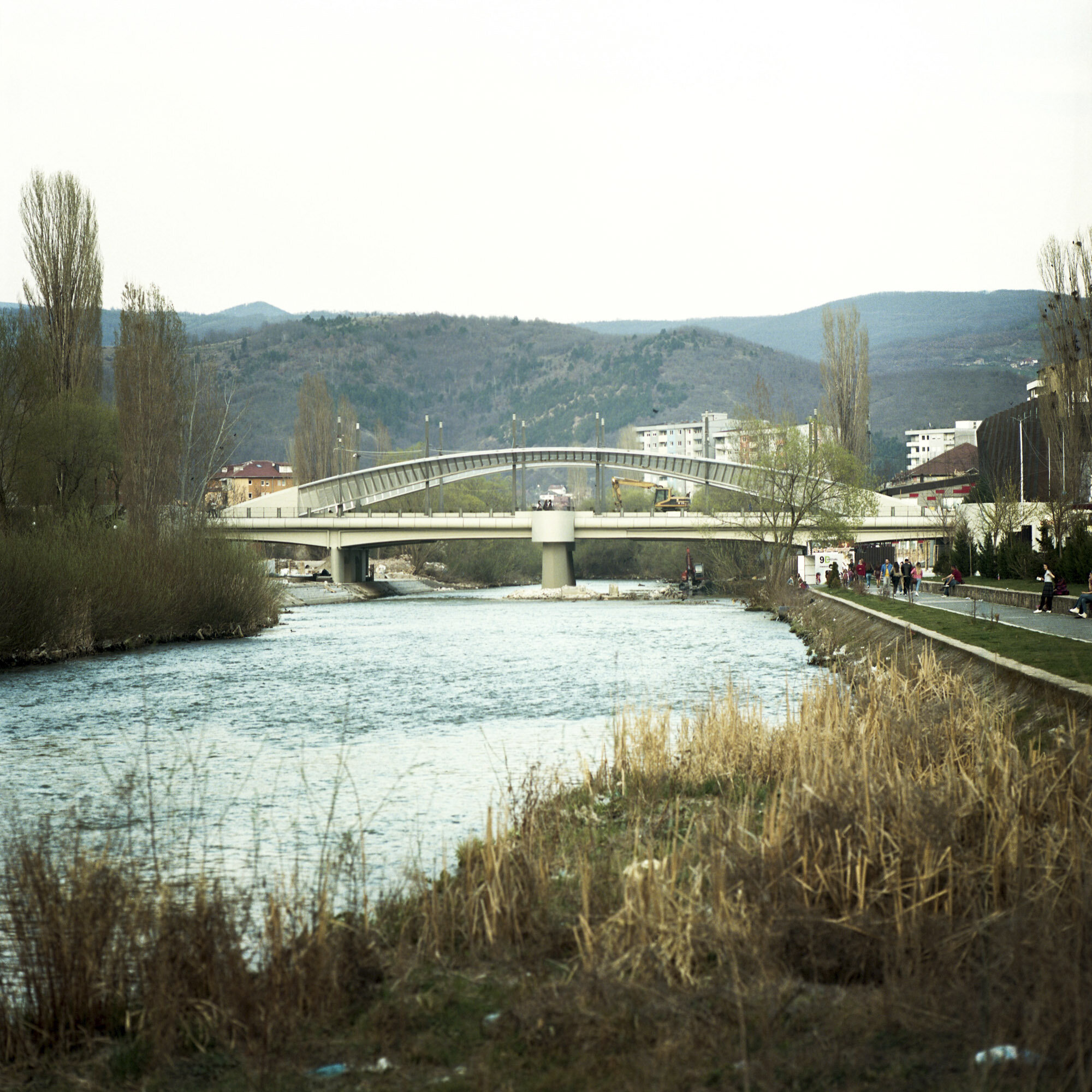  In Mitrovica, the main bridge across the Ibar river connects the Serbian and the Albanian sides of the city. Mitrovica, Kosovo, March 24, 2017. 