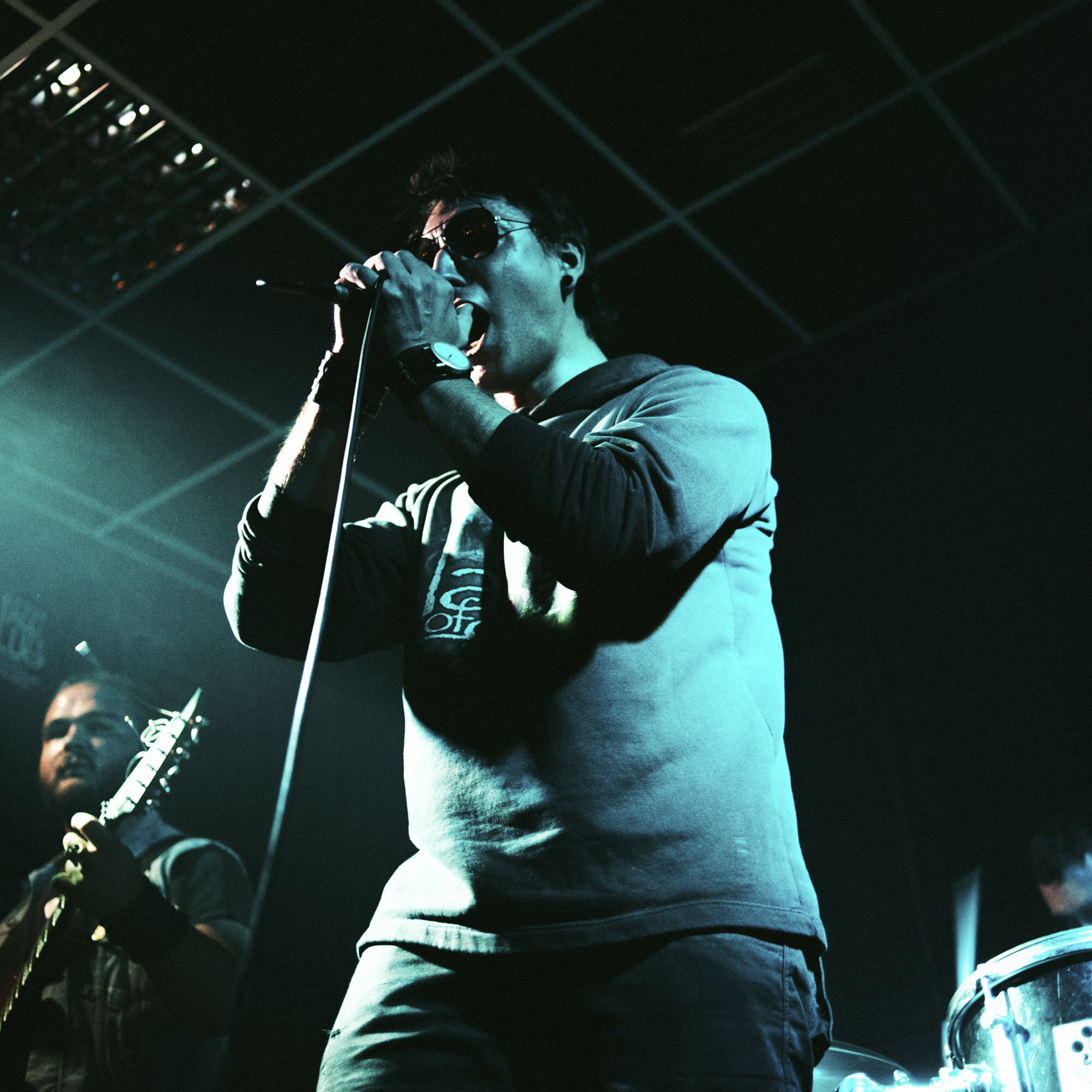 Boris, a young Serb who lives in northern Mitrovica, sings during a gig with his band in the north branch of the Rock School. Mitrovica, March 31, 2017.
