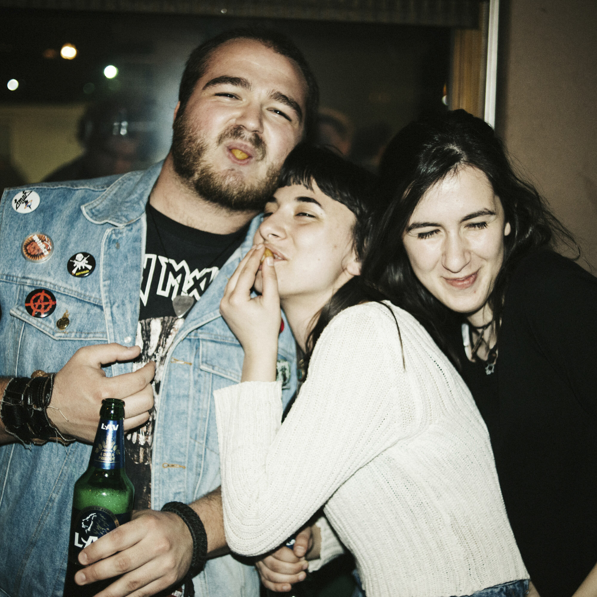  Alem, Ilda and Tringa (from left to right) have fun and drink beers during the gig in the Serbian enclave of Gracanica. Alem is from Montenegro. Ilda has Bosnian and Albanian origins. Tringa is of Albanian origin. They are members of the same multi-