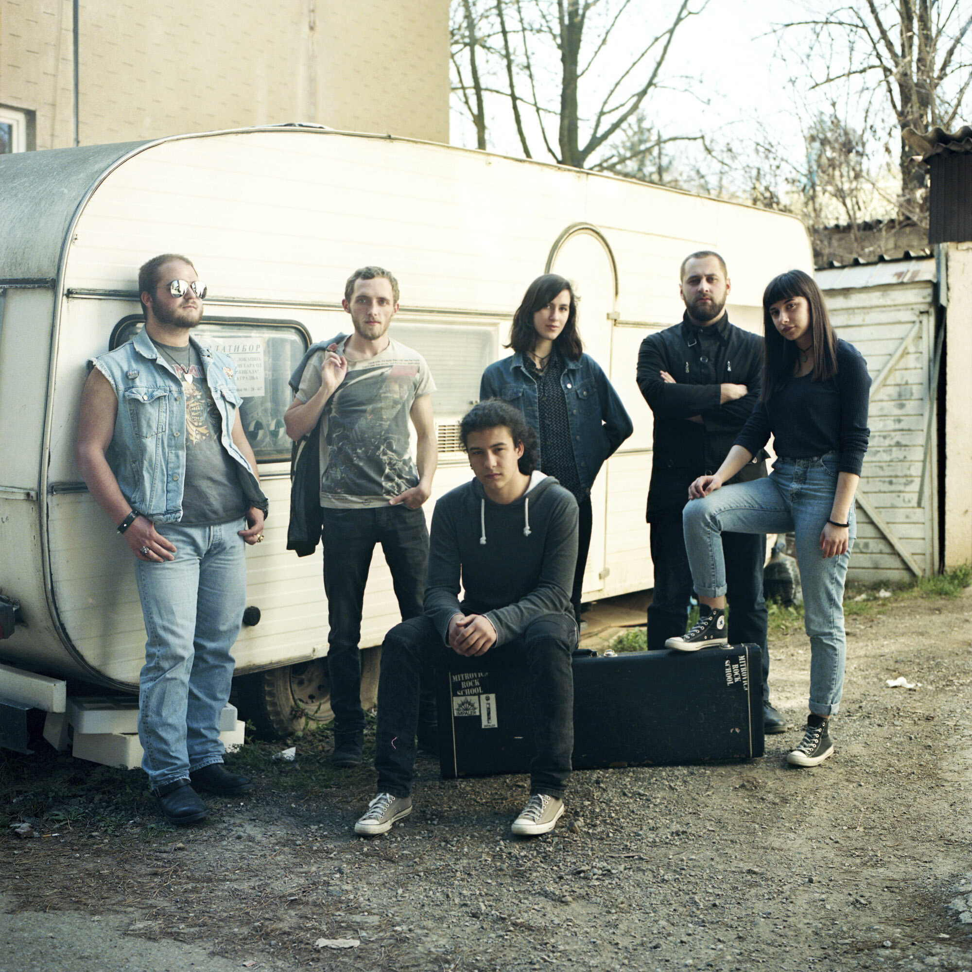  The multi-ethnic rock band Proximity Mine in front of a caravan in the Serbian side of Mitrovica, Kosovo, on March 29, 2017. All of them are students at Mitrovica Rock School. 