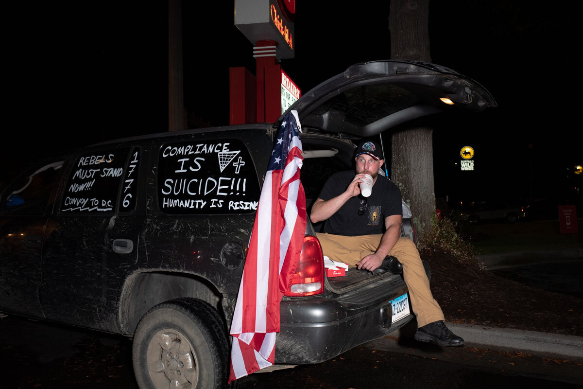  November 12th 2020 - A trump supporter is eating his dinner on the trunk of his car during the #Stopthesteal Caravan in Atlanta. The Caravan started Monday November 9th in Texas and drove through the US heading to Washington to attend the Million Ma