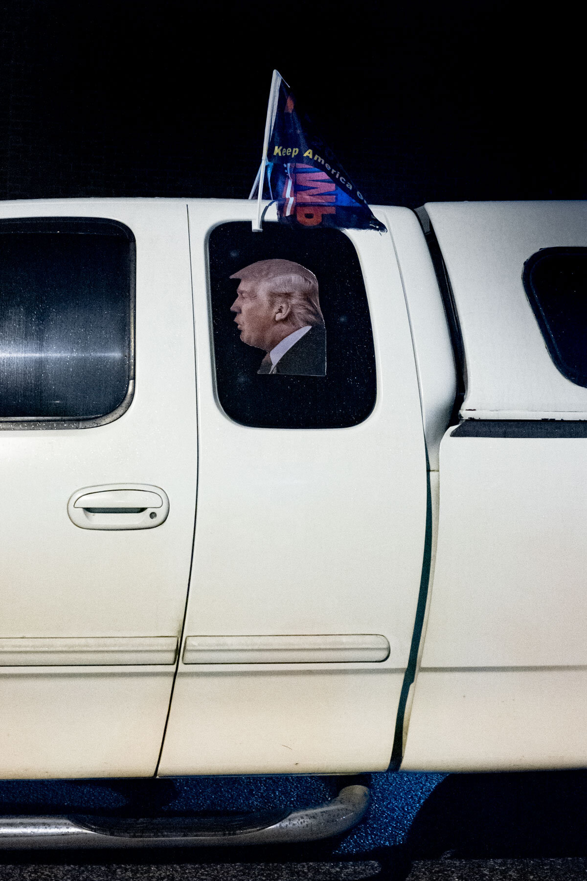  November 12th 2020 - A car presenting a Trump sticker and flag is parked during a #Stopthesteal Caravan rally in Raleigh. 