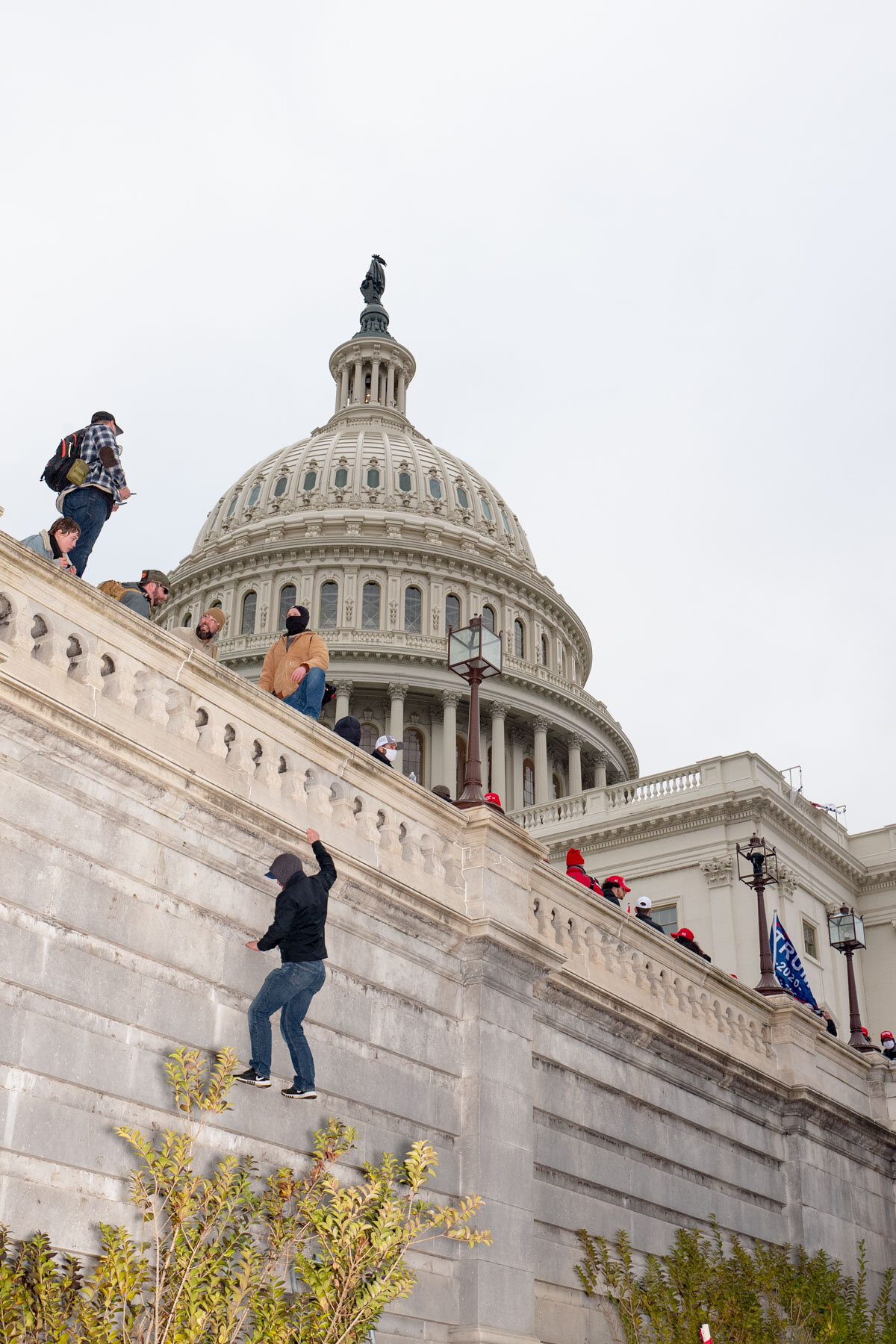  January 6th 2021 - A Trump supporter jumps from the second floor of the Capitol in Washington during the Storm of the Capitol. After following the mob and using makeshift latters, the supporters realized there were few entrances in the second floor 