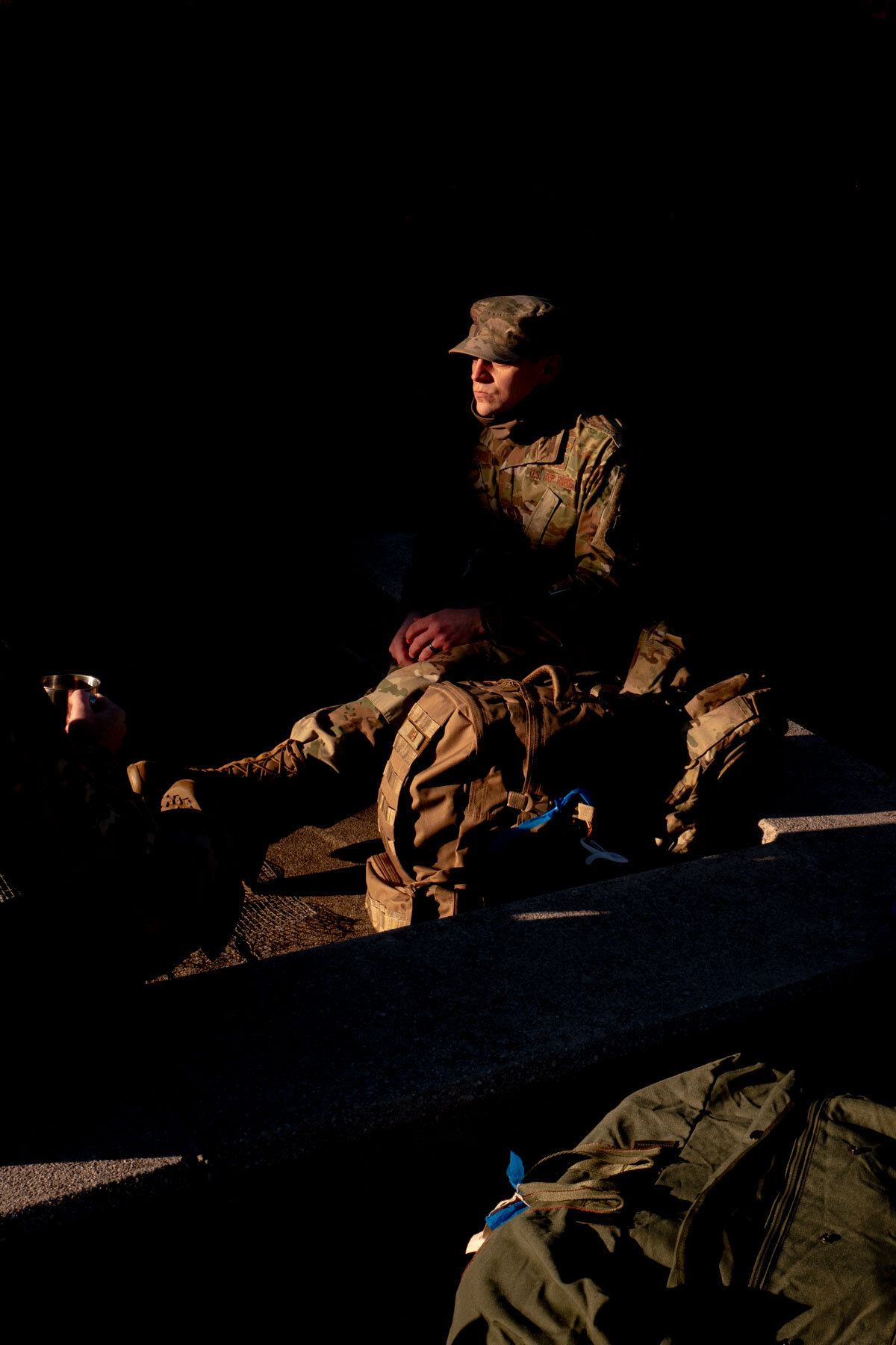  January 19th 2021 - A member of the National Guard is having lunch near the Washington Monument on Inauguration Eve. 250 000 members of the national Guard have been deployed in all states after the period of unrest following the Storming of the Capi