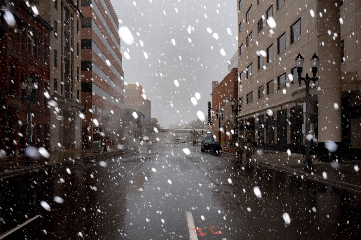  January 17th 2021 - Snowflakes falling on an avenue of Lansing after National Guard blocked the roads leading to the State Capitol fearing for armed protests awaiting President Biden's inauguration.  