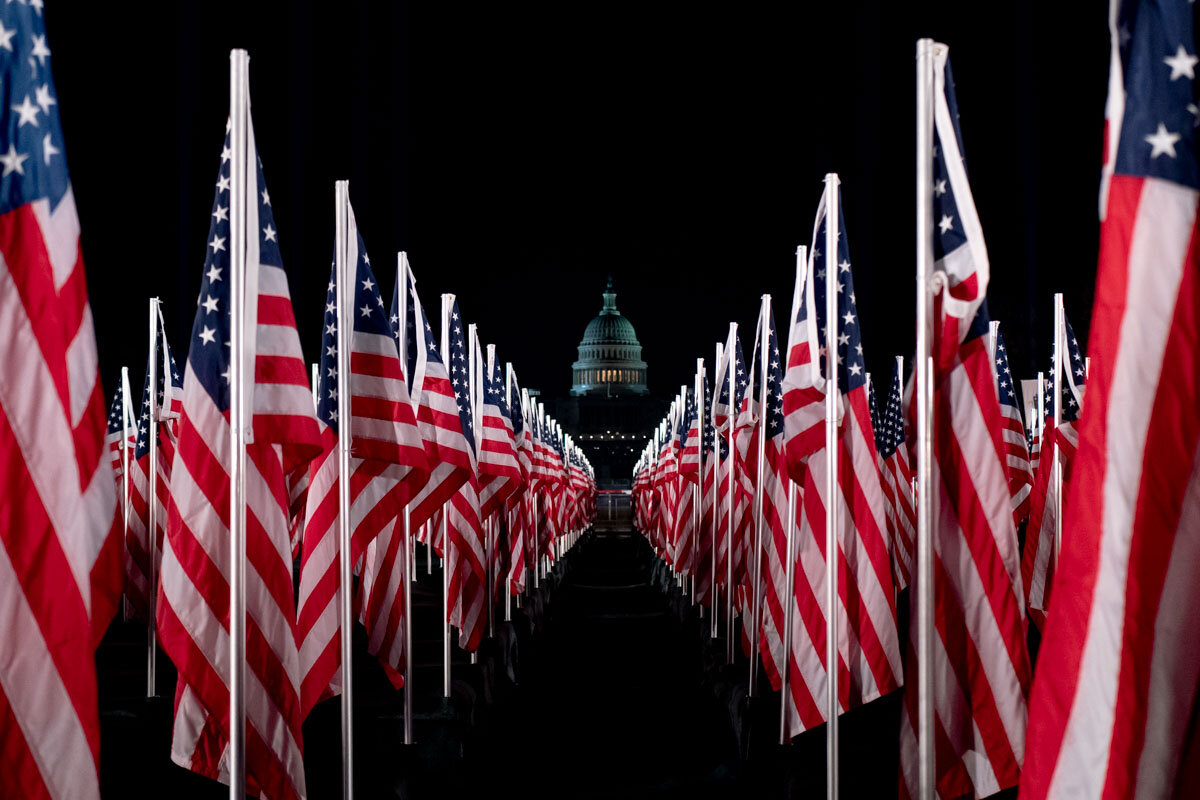  January 20th 2021 - The Capitol in Inauguration Day, the Mall has been filled with American flags and the area in under high security after the period of unrest. 