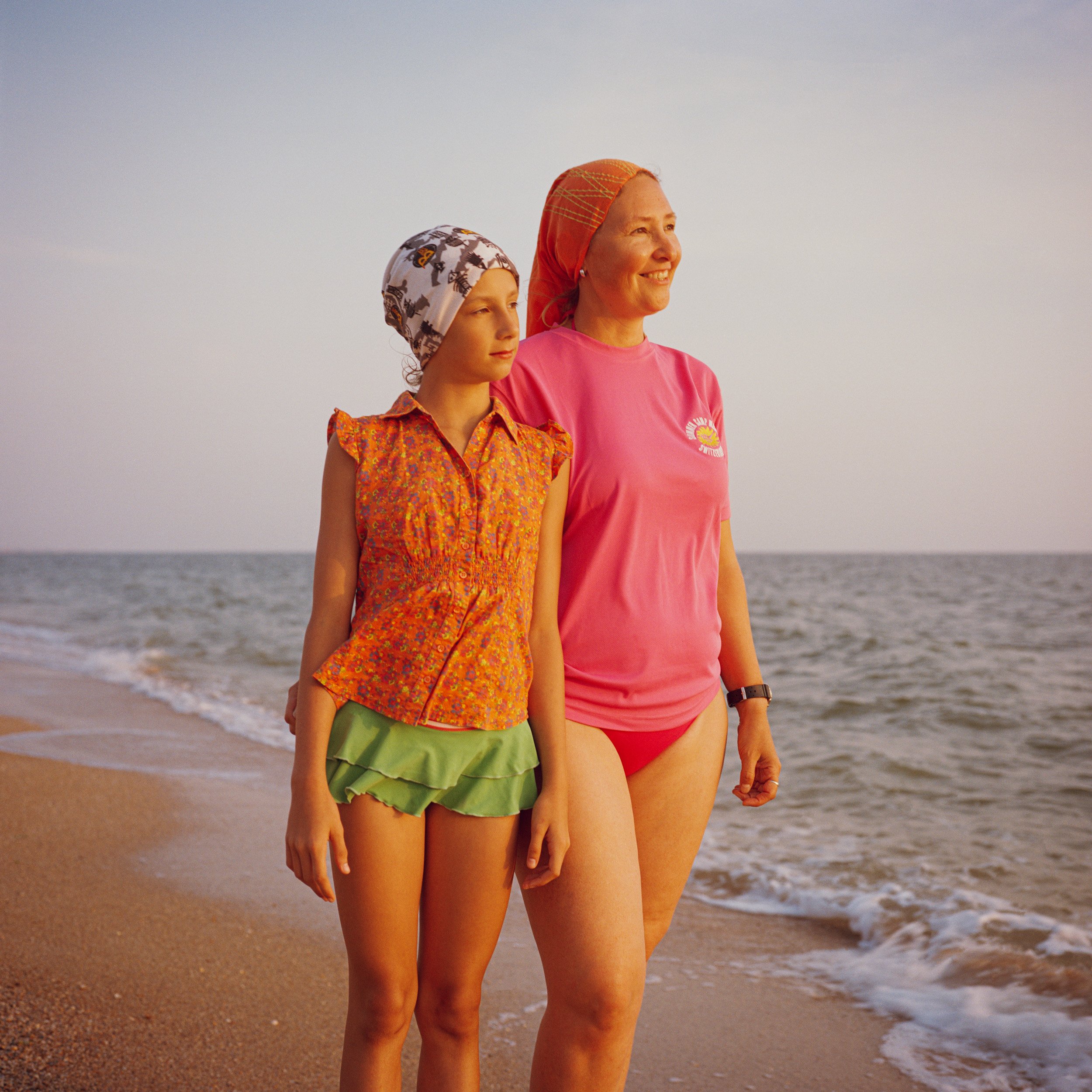  July 2019. Dolzhanskaya spit, Krasnodar Krai, Russia. Russian mother and daughter on holiday on the Sea of Azov. 