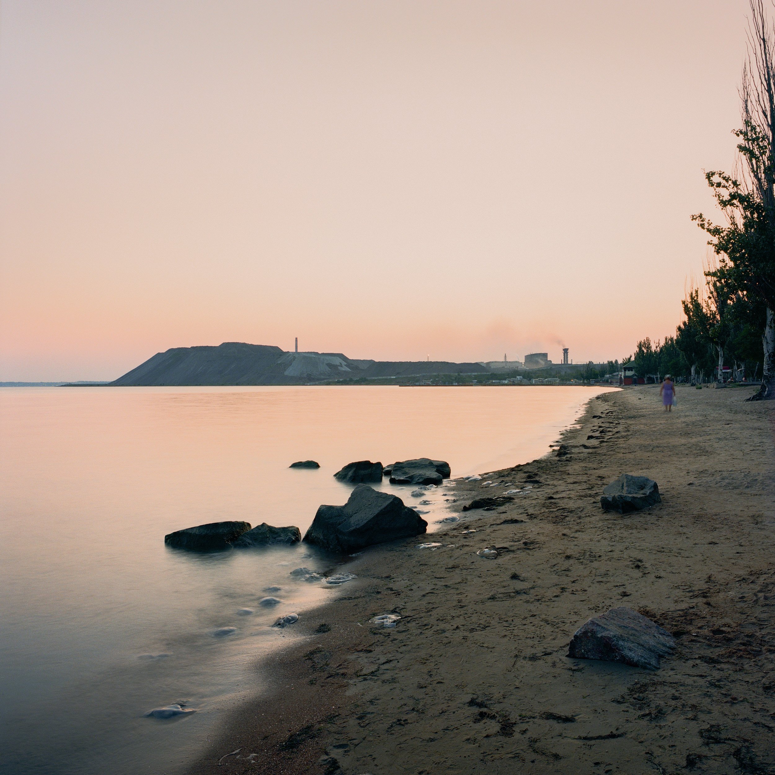  August 2021. Mariupol, Ukraine. The slag mountain of the Azovstal Iron and Steel Works on the Sea of Azov. The company, established in 1930 in the former USSR, produces and sells steel products worldwide. According to a Ukrainian Ecology Ministry re